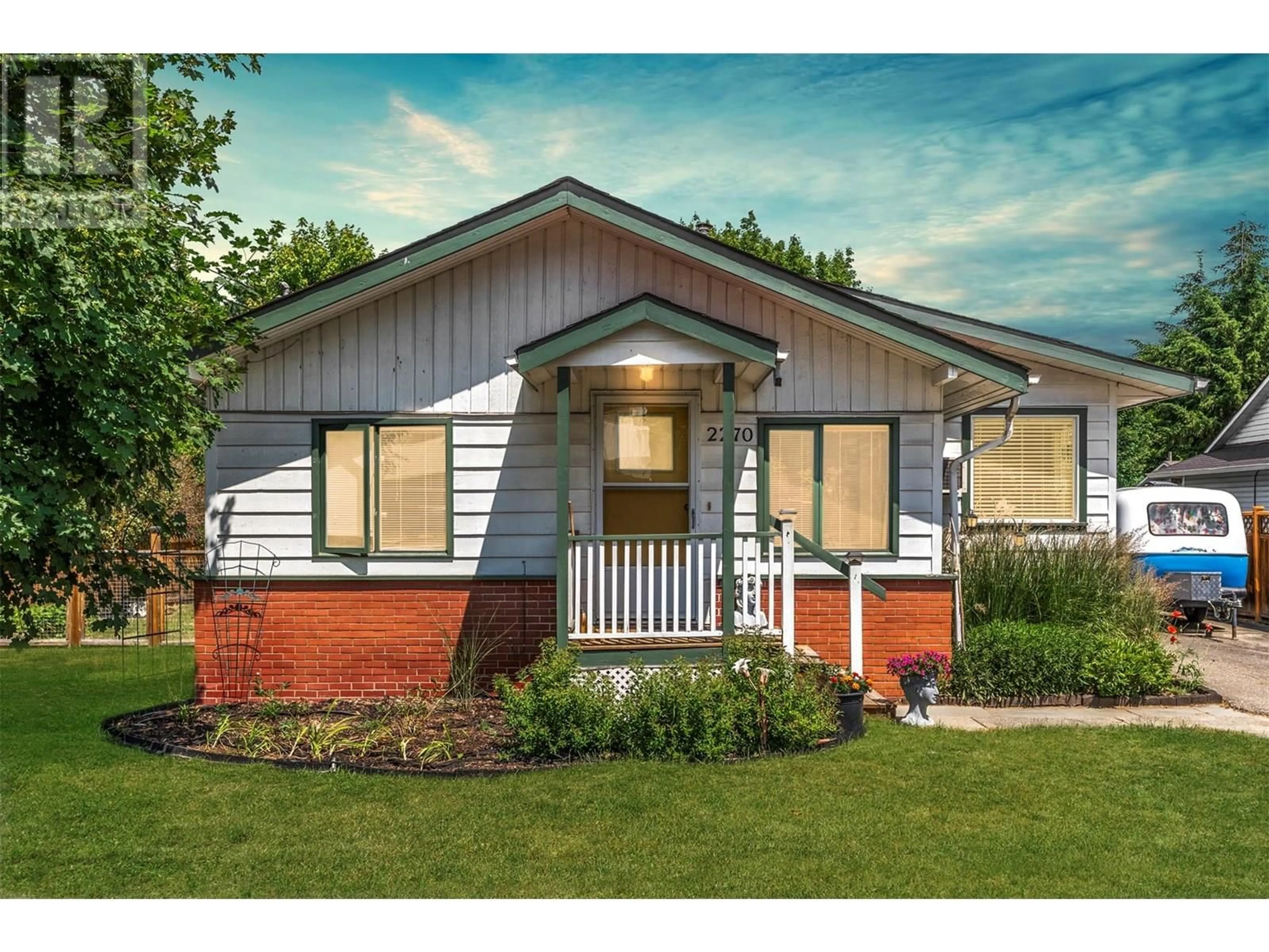 Home with vinyl exterior material, street for 2270 WILSON AVENUE, Armstrong British Columbia V4Y0B1