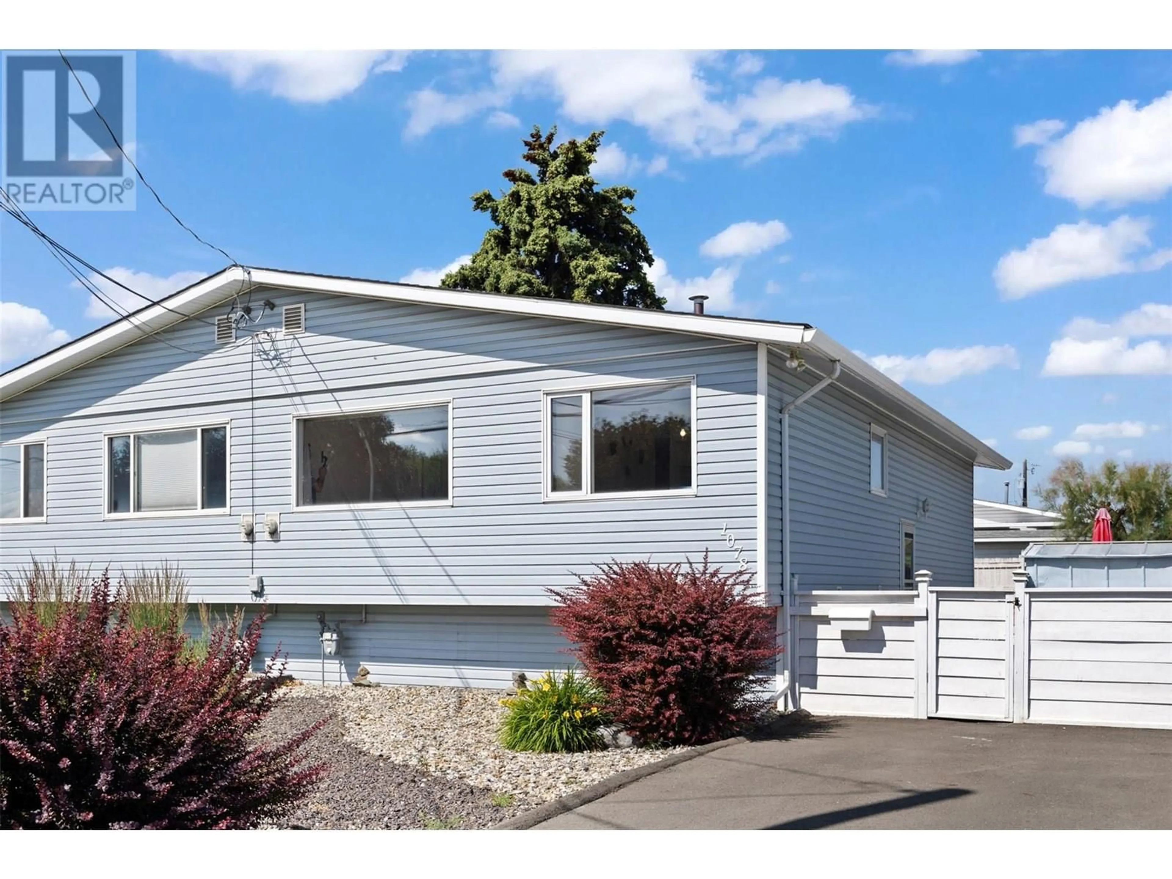 Home with vinyl exterior material, street for 1078 WINDBREAK STREET, Kamloops British Columbia V2B5P9