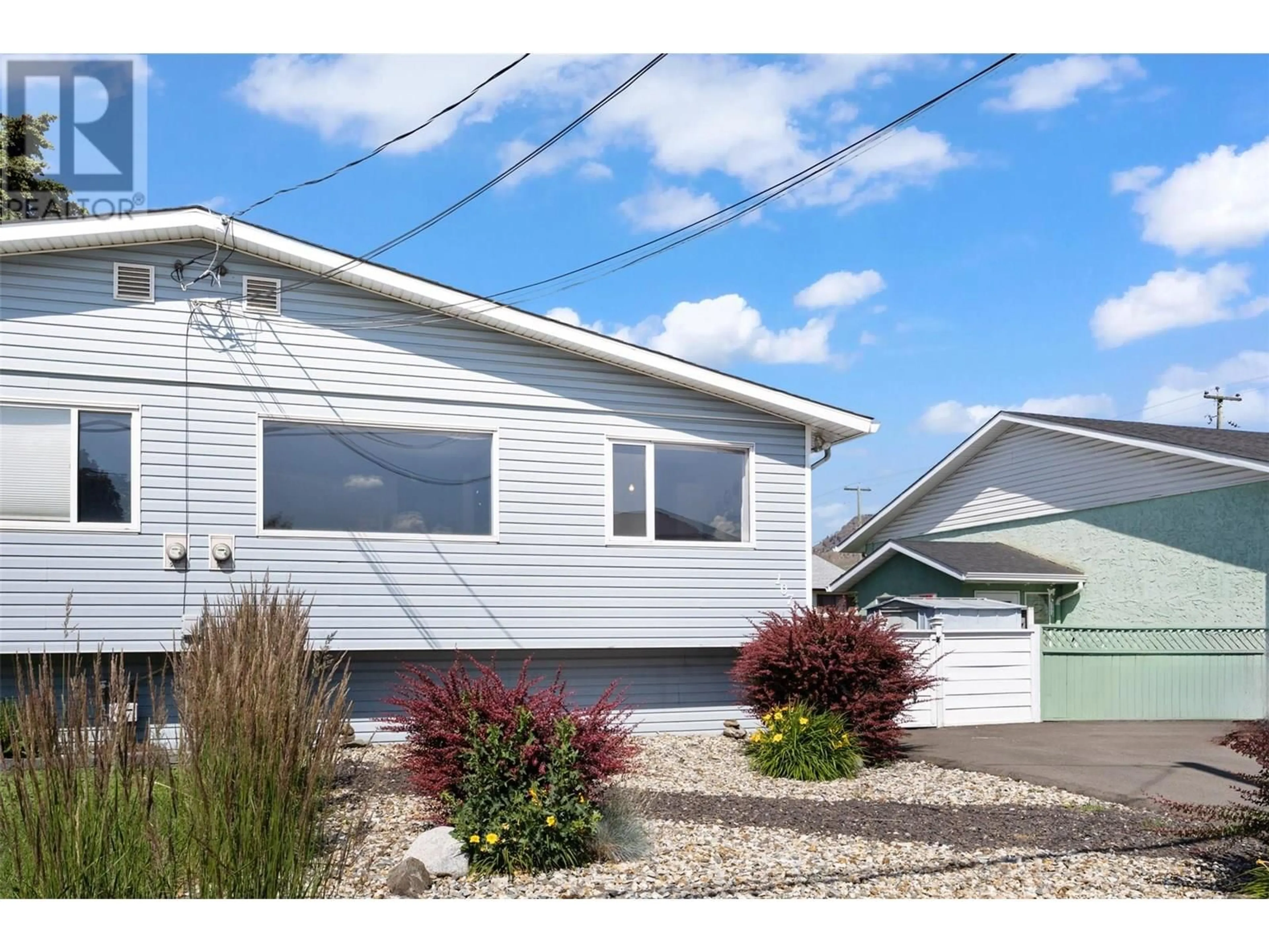 Home with vinyl exterior material, street for 1078 WINDBREAK STREET, Kamloops British Columbia V2B5P9