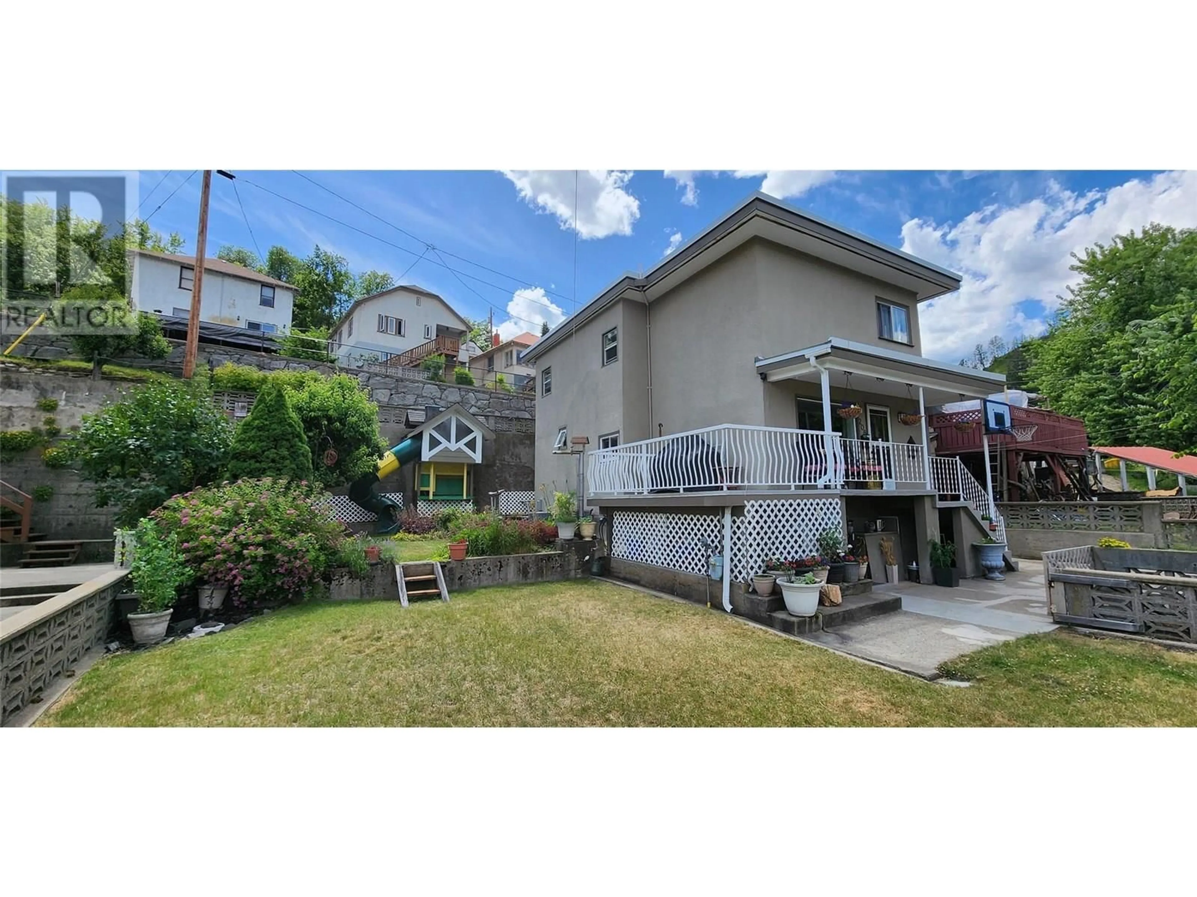A pic from outside/outdoor area/front of a property/back of a property/a pic from drone, street for 208 LEROSE STREET, Trail British Columbia V1R3L8