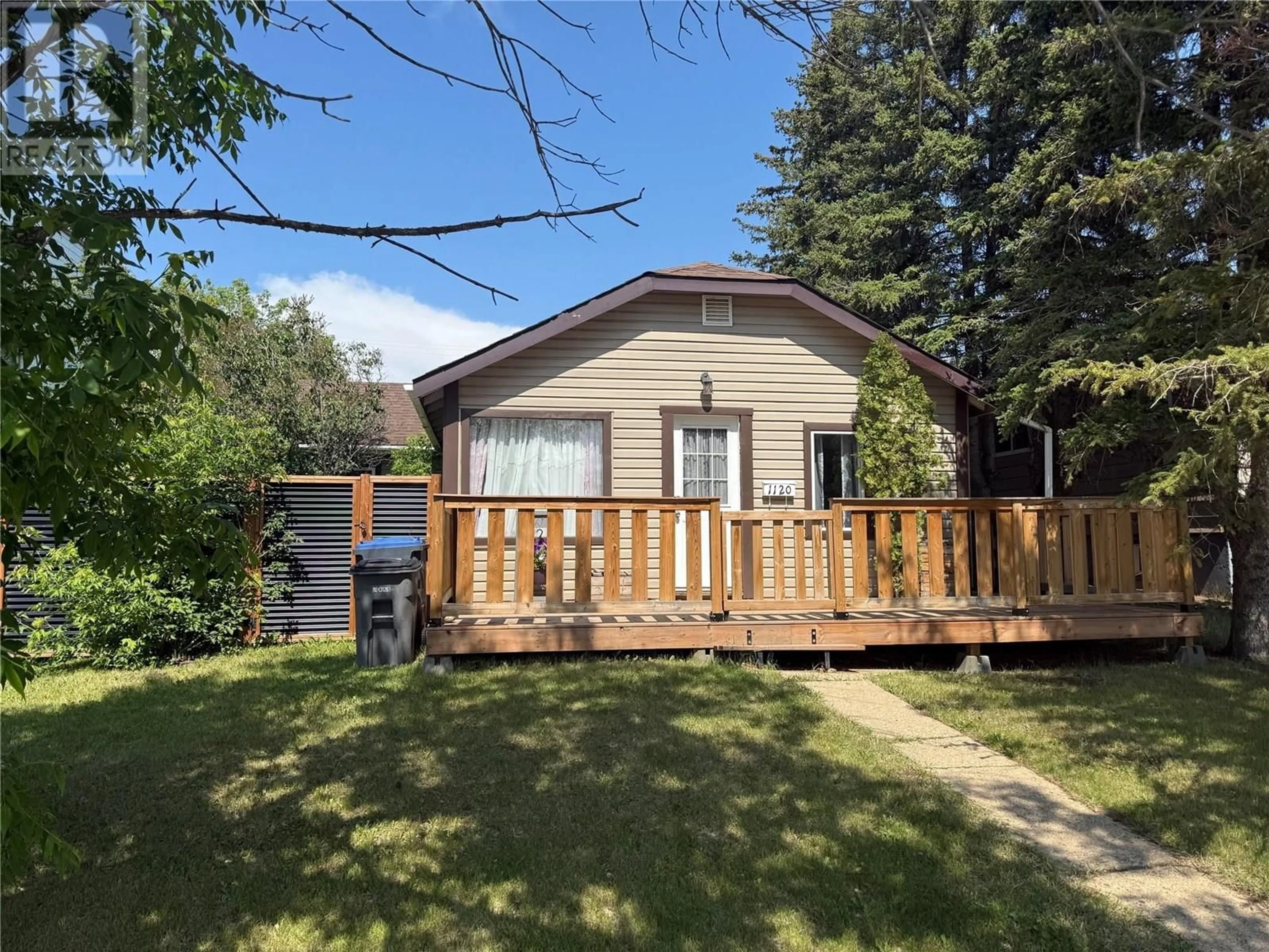 A pic from outside/outdoor area/front of a property/back of a property/a pic from drone, street for 1120 104 AVENUE, Dawson Creek British Columbia V1G2J2