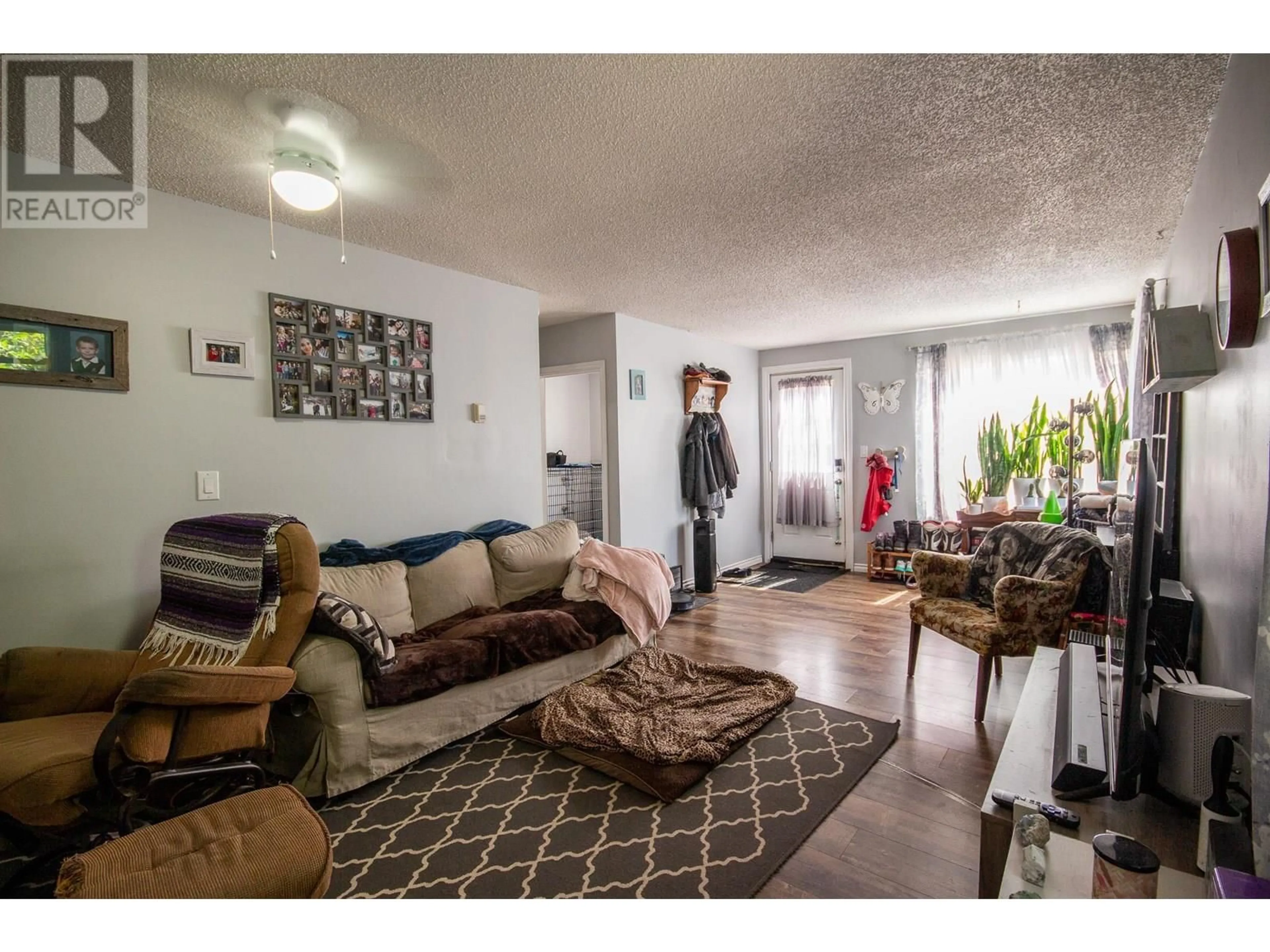 Living room with furniture, unknown for 1120 104 AVENUE, Dawson Creek British Columbia V1G2J2