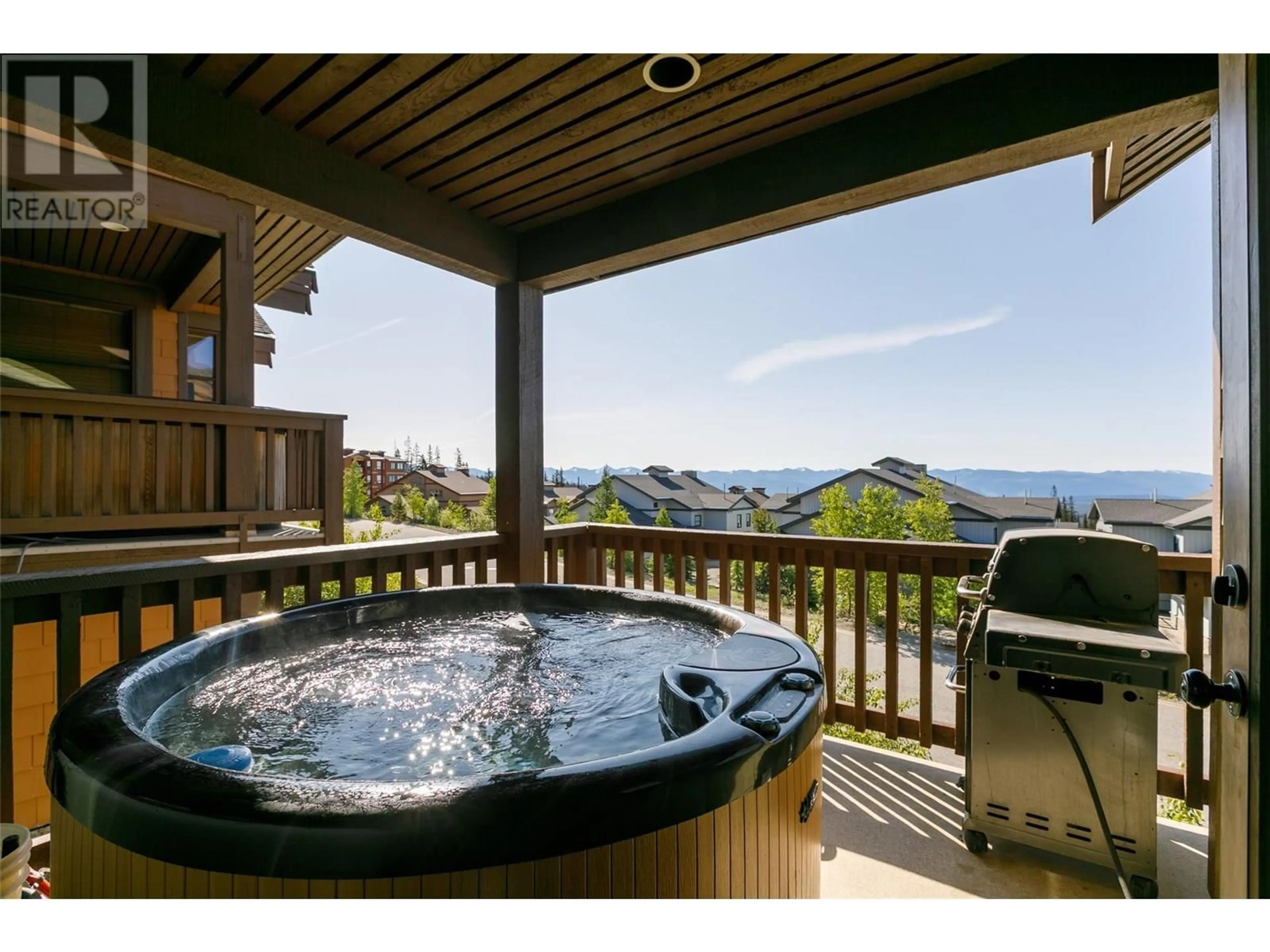 Patio, water/lake/river/ocean view for 109 - 5080 SNOWBIRD WAY, Big White British Columbia V1P1P4