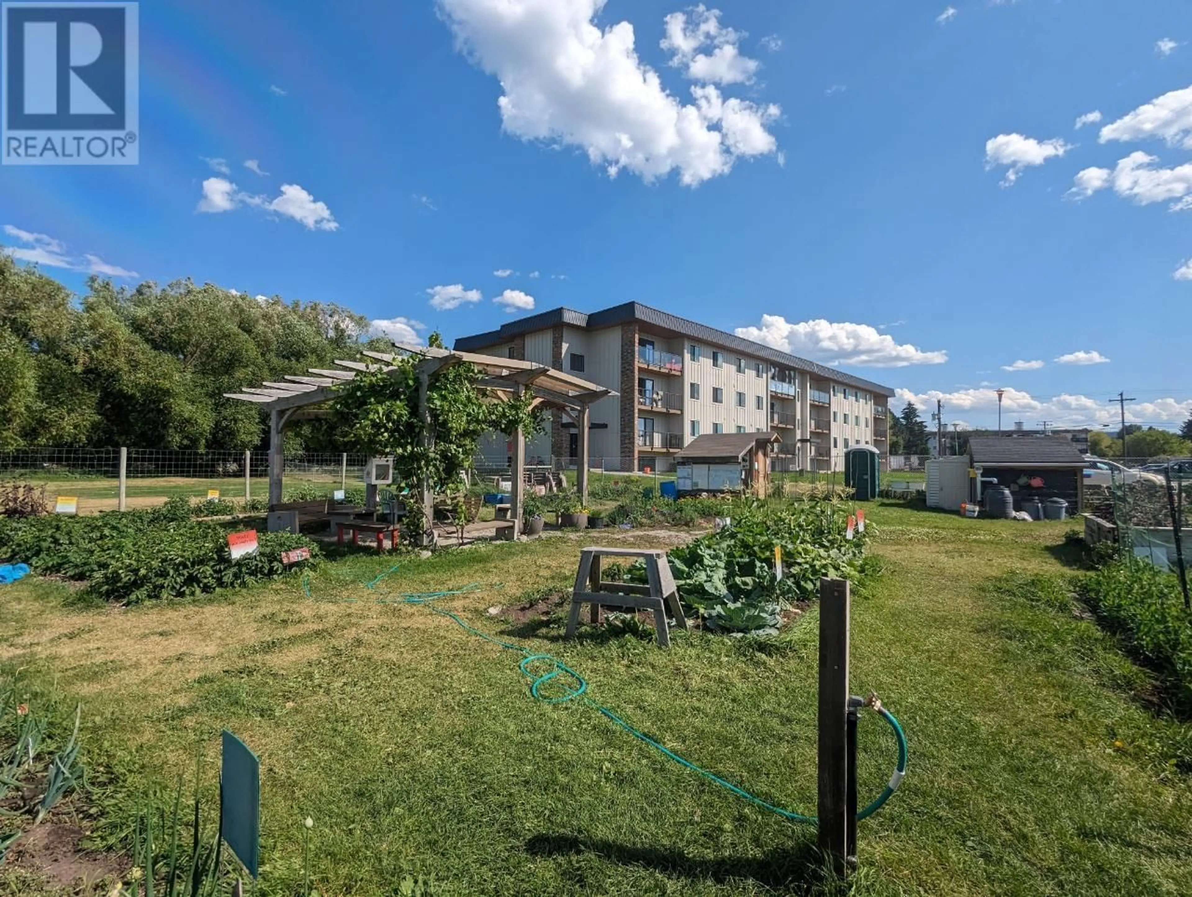 A pic from outside/outdoor area/front of a property/back of a property/a pic from drone, mountain view for 203 - 606 18TH AVENUE NORTH, Cranbrook British Columbia V1C5M1