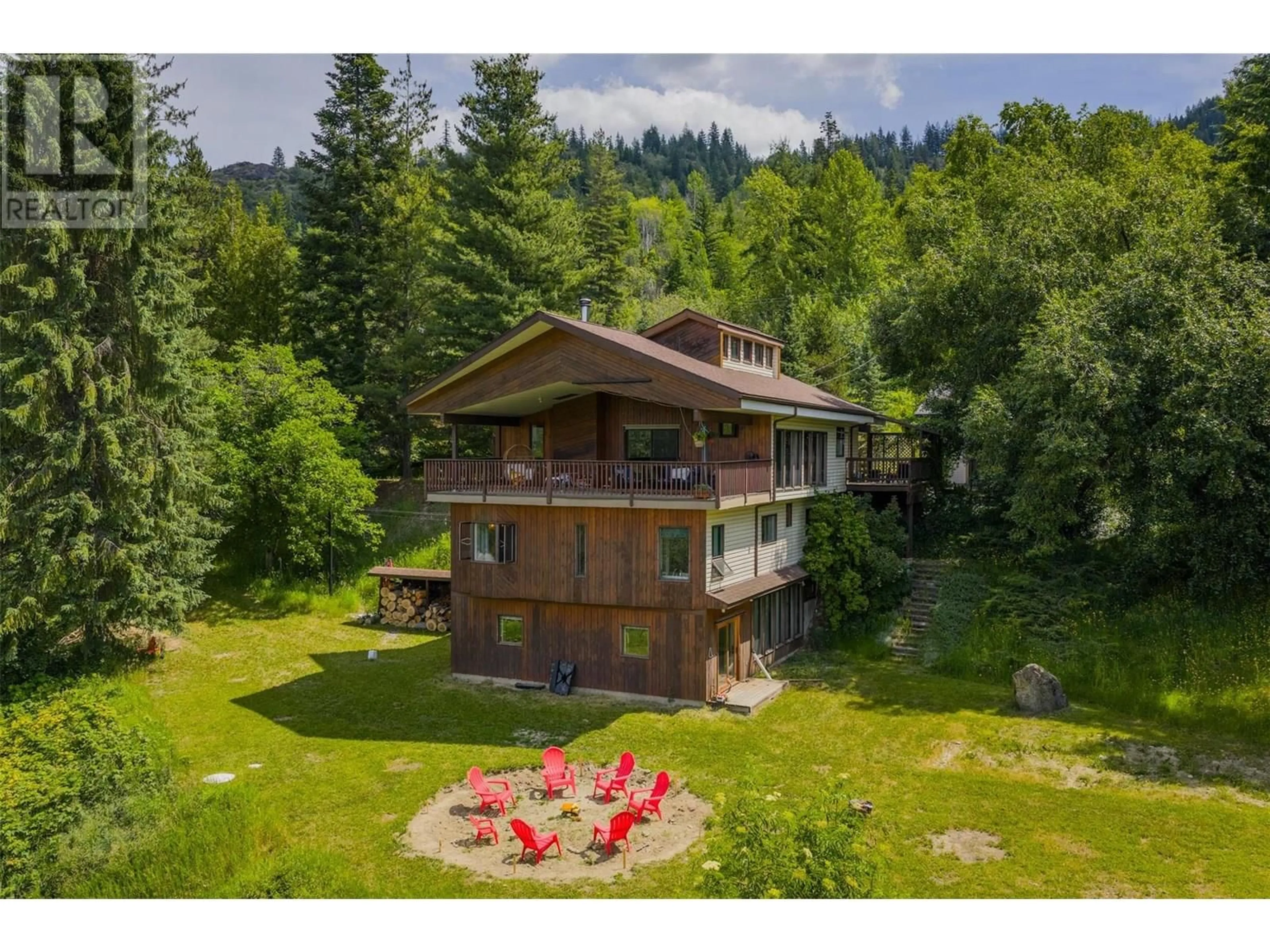 A pic from outside/outdoor area/front of a property/back of a property/a pic from drone, unknown for 1137 MCLEOD ROAD, Beaver Falls British Columbia V0G1L1