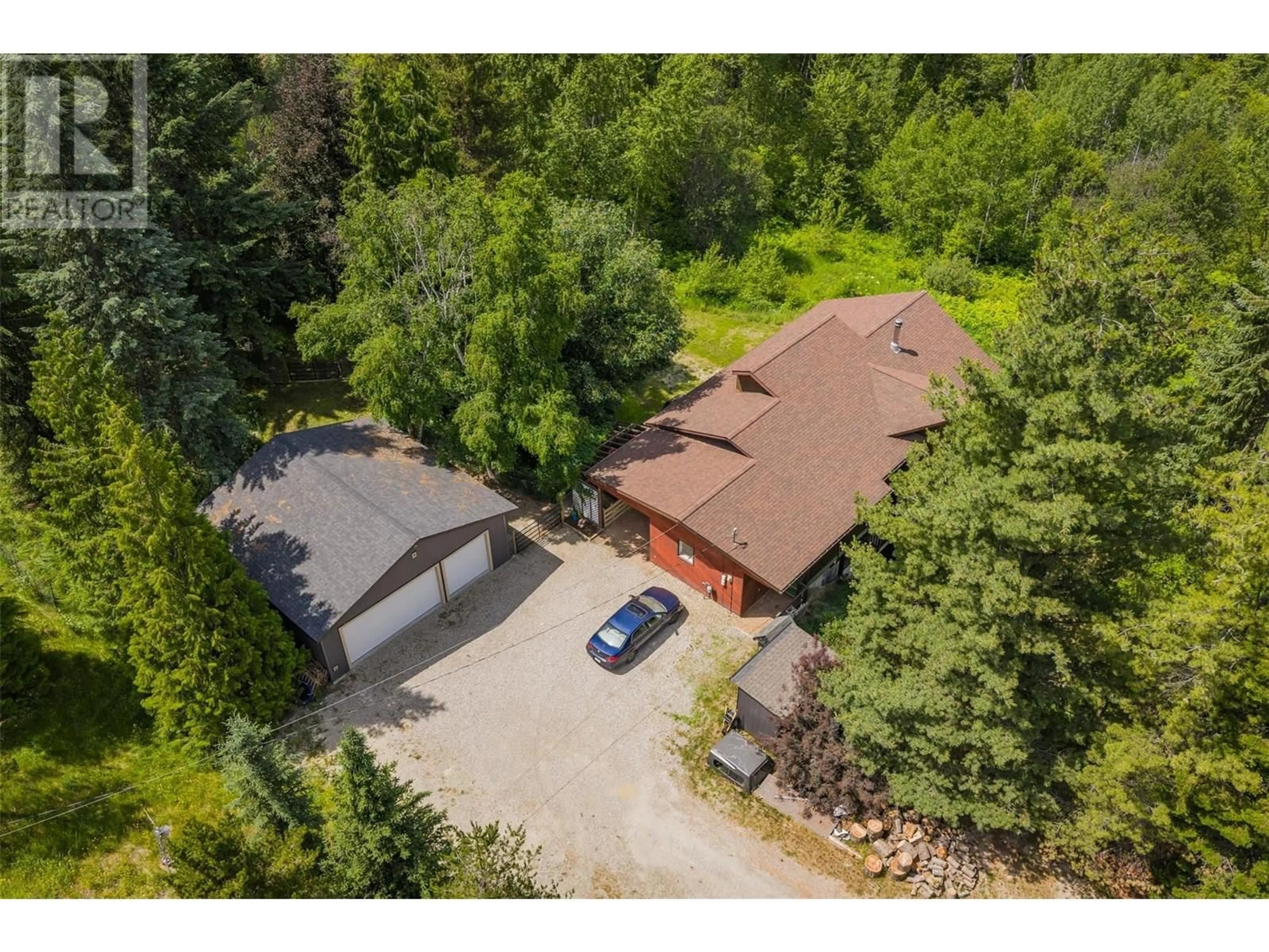 A pic from outside/outdoor area/front of a property/back of a property/a pic from drone, unknown for 1137 MCLEOD ROAD, Beaver Falls British Columbia V0G1L1