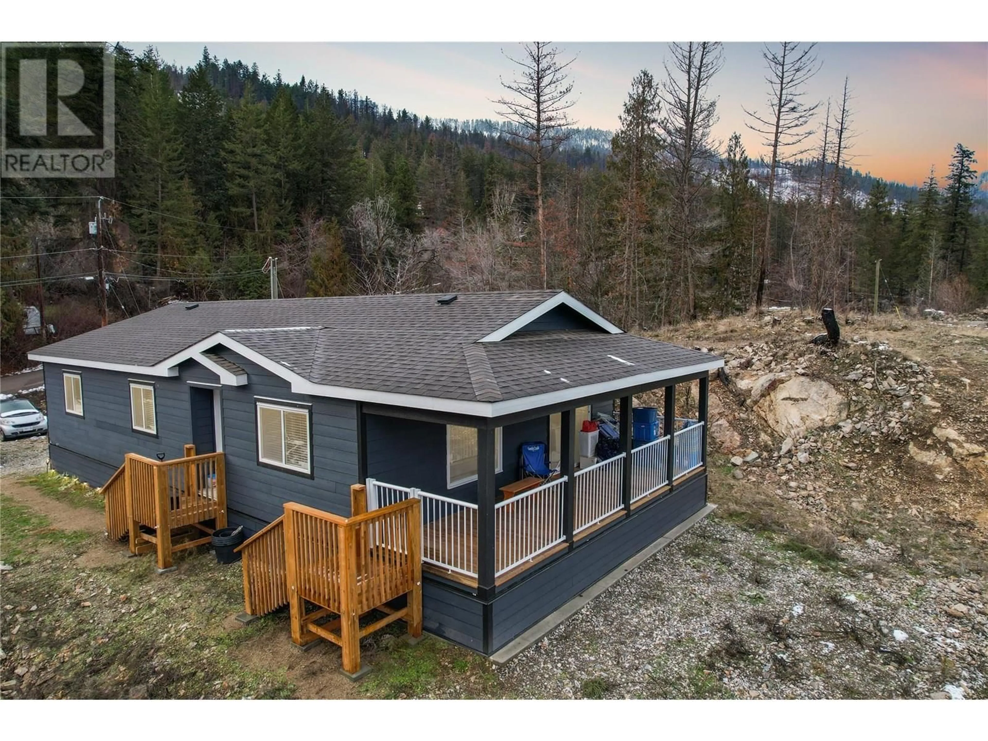 A pic from outside/outdoor area/front of a property/back of a property/a pic from drone, mountain view for 9369 KEITHLEY ROAD, Vernon British Columbia V1H2C8