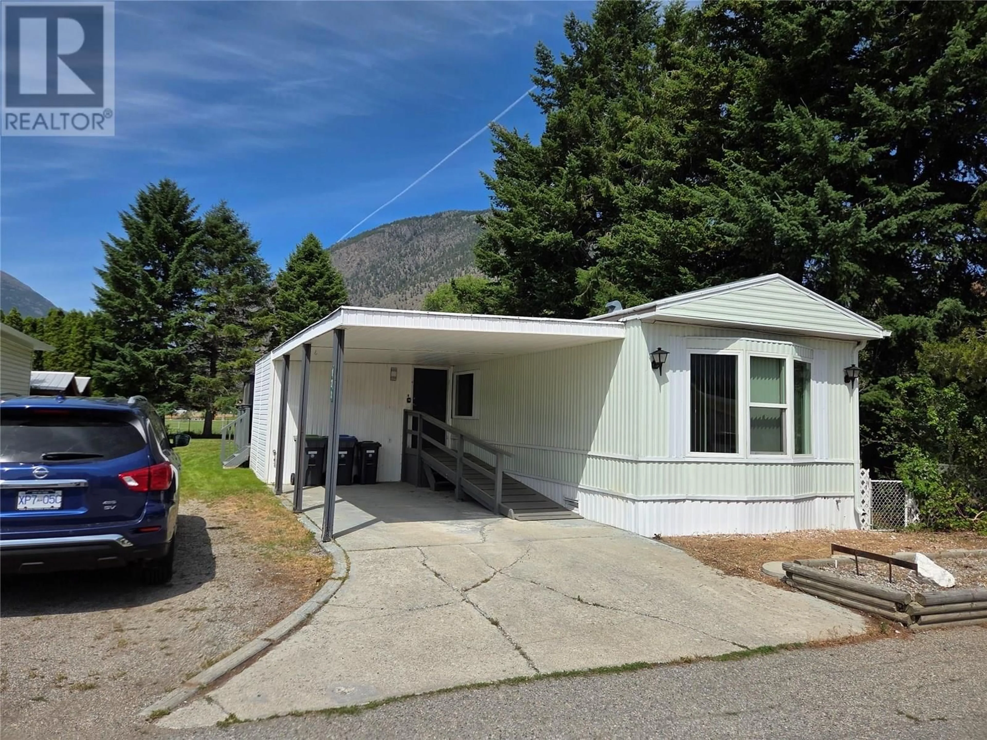 Home with vinyl exterior material, mountain view for 121 - 914 BLAKEBOROUGH AVENUE, Keremeos British Columbia V0X1N2