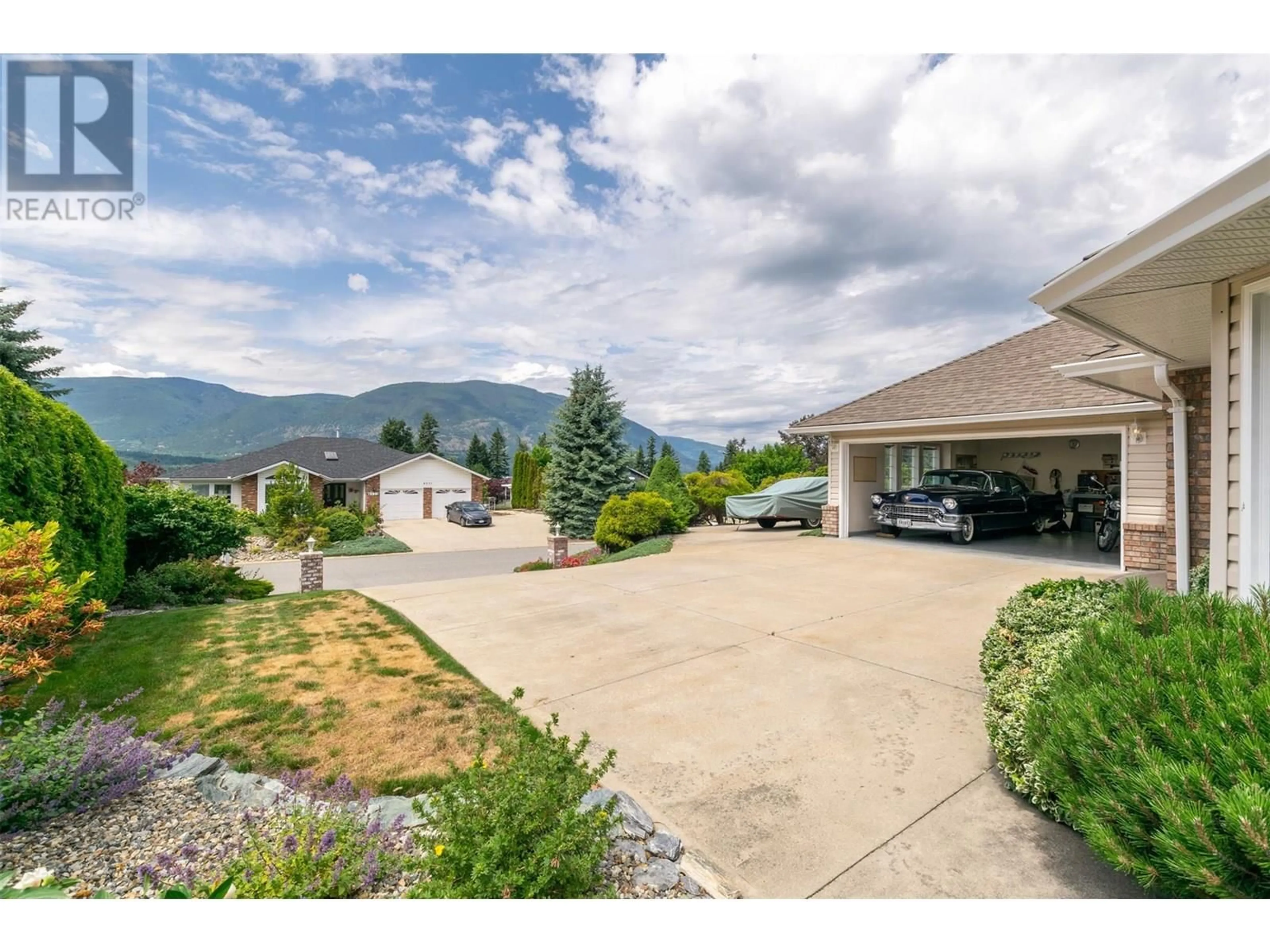 A pic from outside/outdoor area/front of a property/back of a property/a pic from drone, mountain view for 4640 13 STREET NORTHEAST, Salmon Arm British Columbia V1E1E3