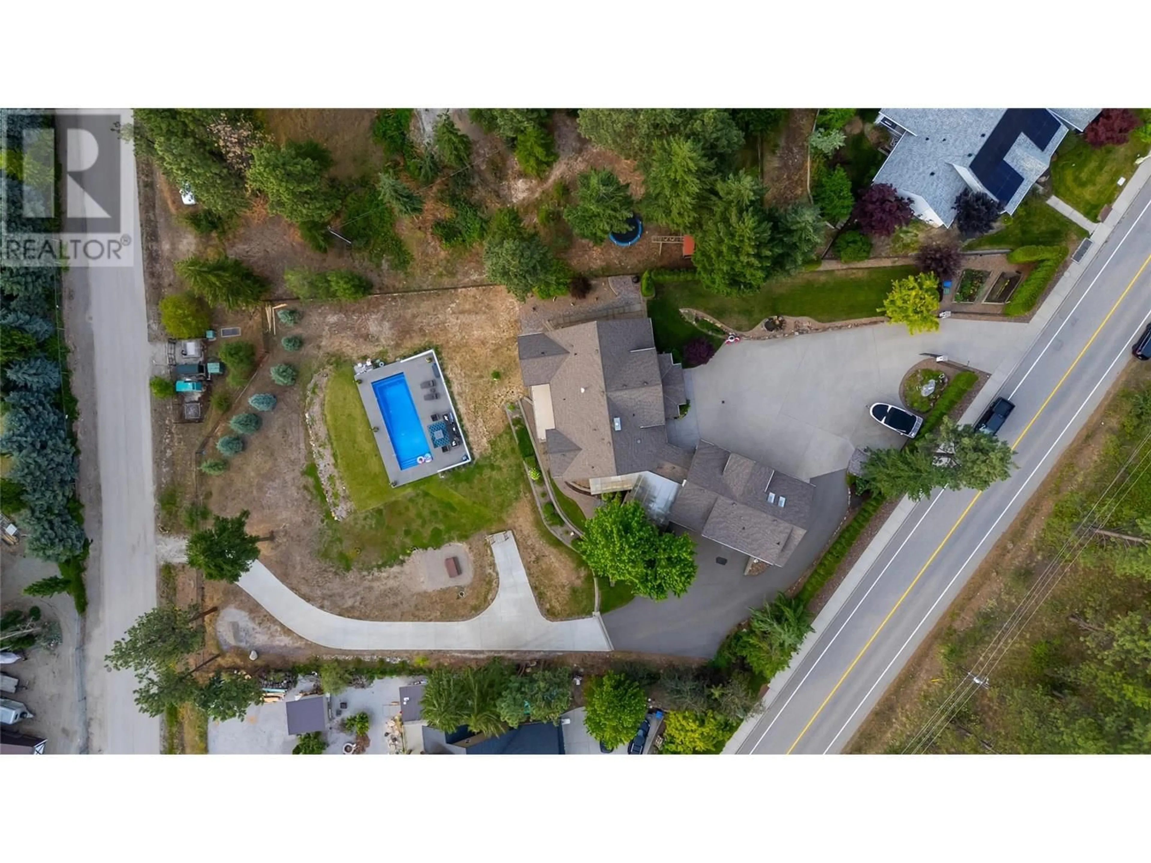 A pic from outside/outdoor area/front of a property/back of a property/a pic from drone, street for 1948 DAVIDSON ROAD, Lake Country British Columbia V4V1J8