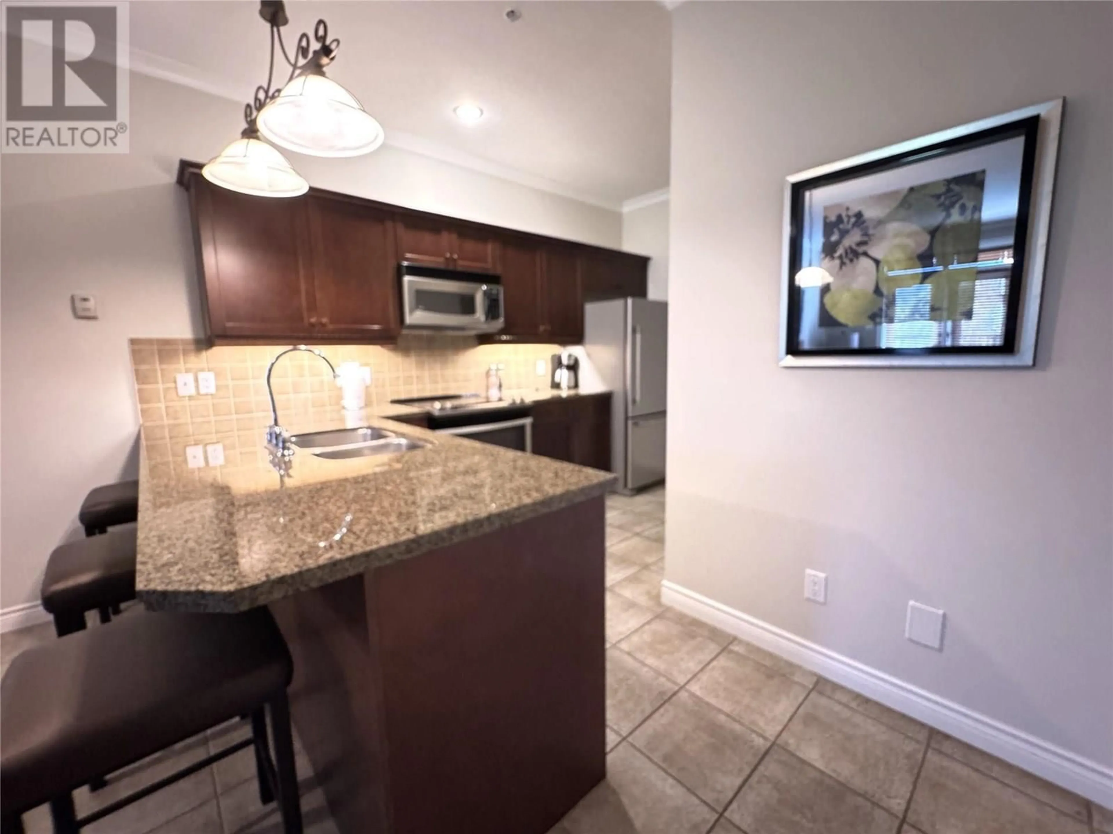 Open concept kitchen, ceramic/tile floor for 236B - 200 BIGHORN BOULEVARD, Radium Hot Springs British Columbia V0A1M0