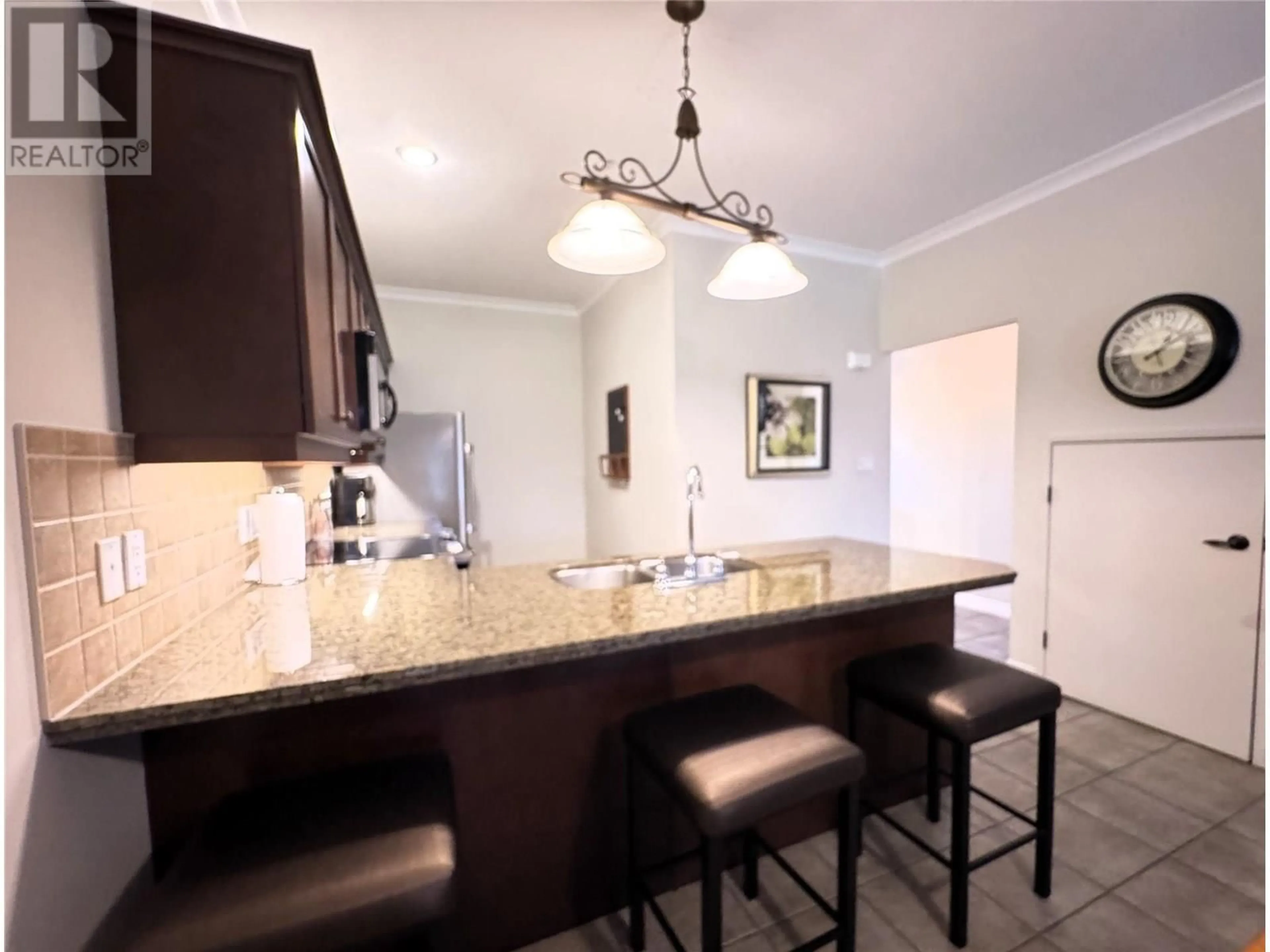 Open concept kitchen, ceramic/tile floor for 236B - 200 BIGHORN BOULEVARD, Radium Hot Springs British Columbia V0A1M0