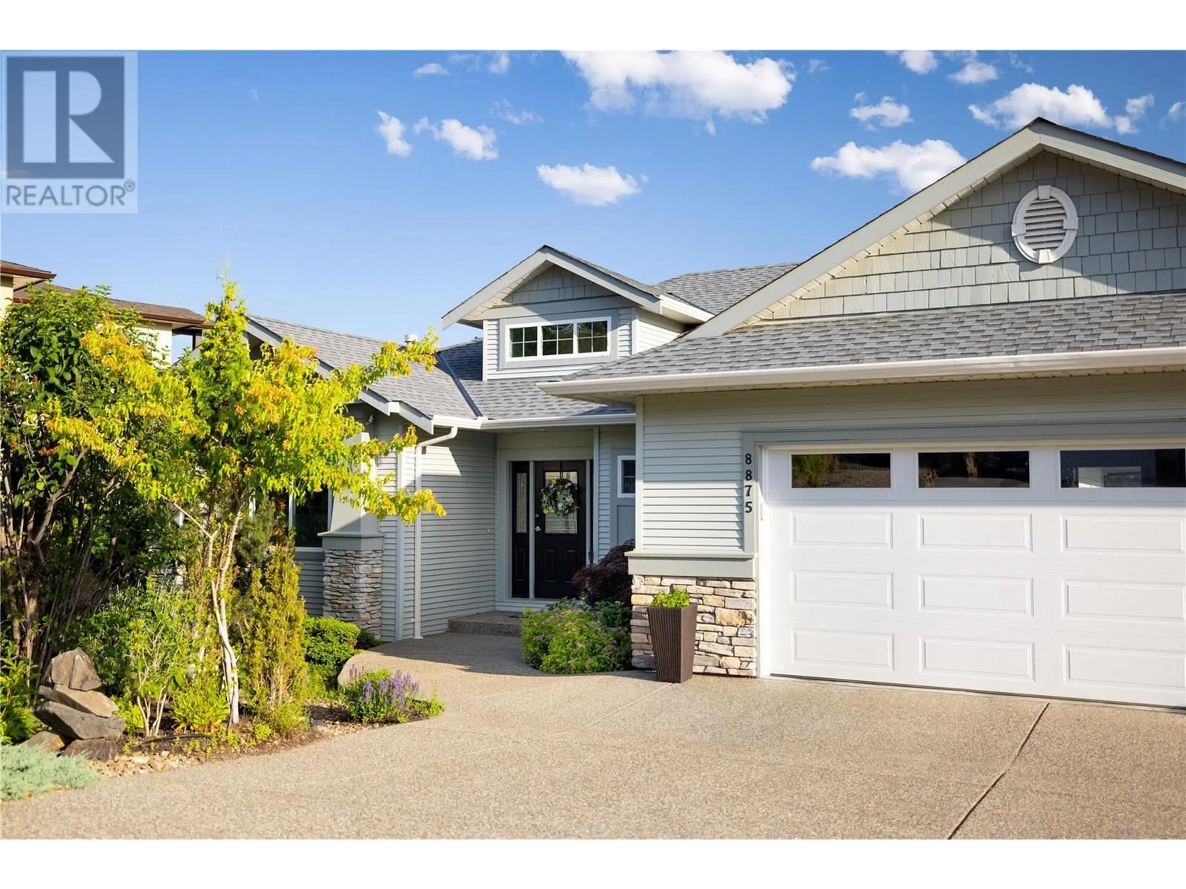 Home with vinyl exterior material, street for 8875 BRAEBURN DRIVE, Coldstream British Columbia V1B3W8