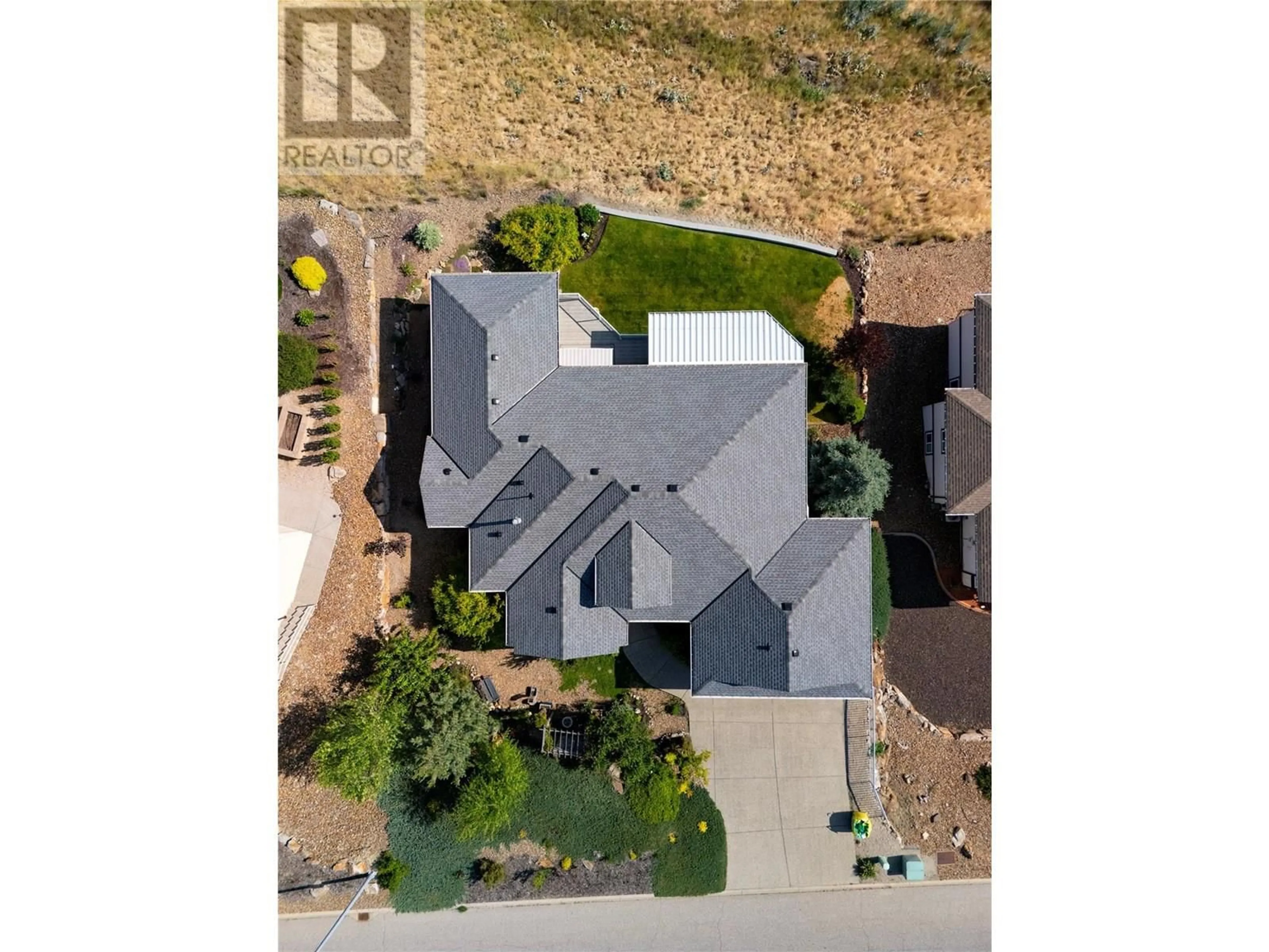 A pic from outside/outdoor area/front of a property/back of a property/a pic from drone, street for 8875 BRAEBURN DRIVE, Coldstream British Columbia V1B3W8