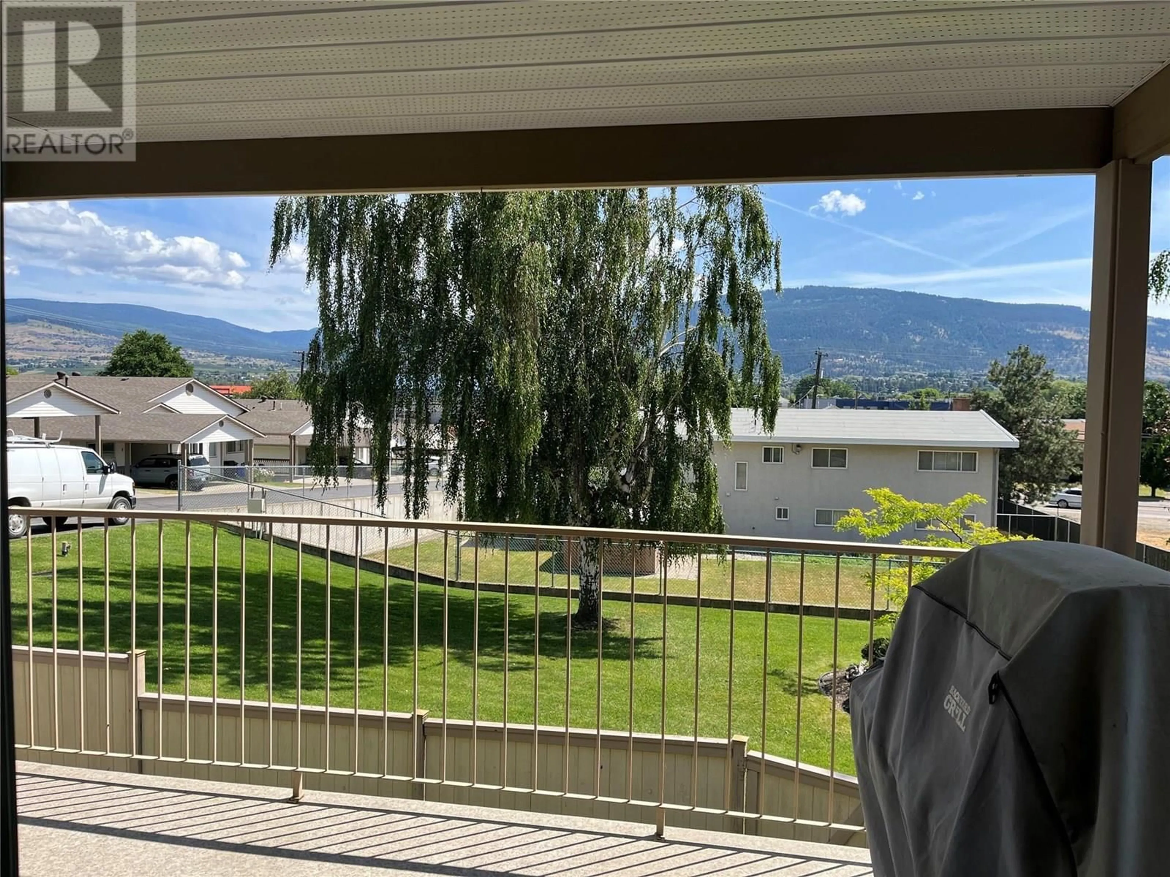 Balcony in the apartment, mountain view for 23 - 4210 ALEXIS PARK DRIVE, Vernon British Columbia V1T6H3