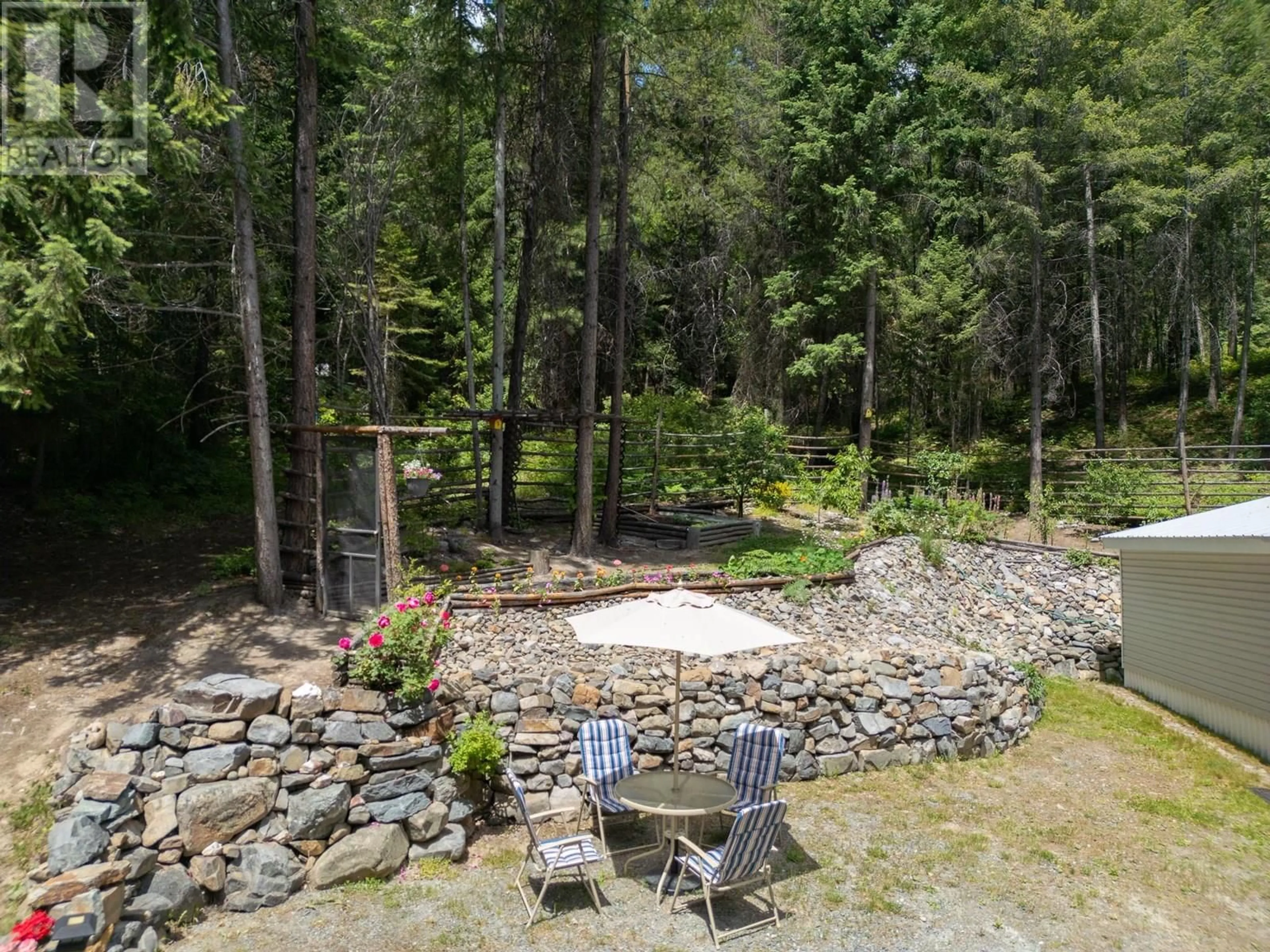 Patio, forest/trees view for 8682 YAHK SETTLEMENT ROAD, Yahk British Columbia V0B1W1