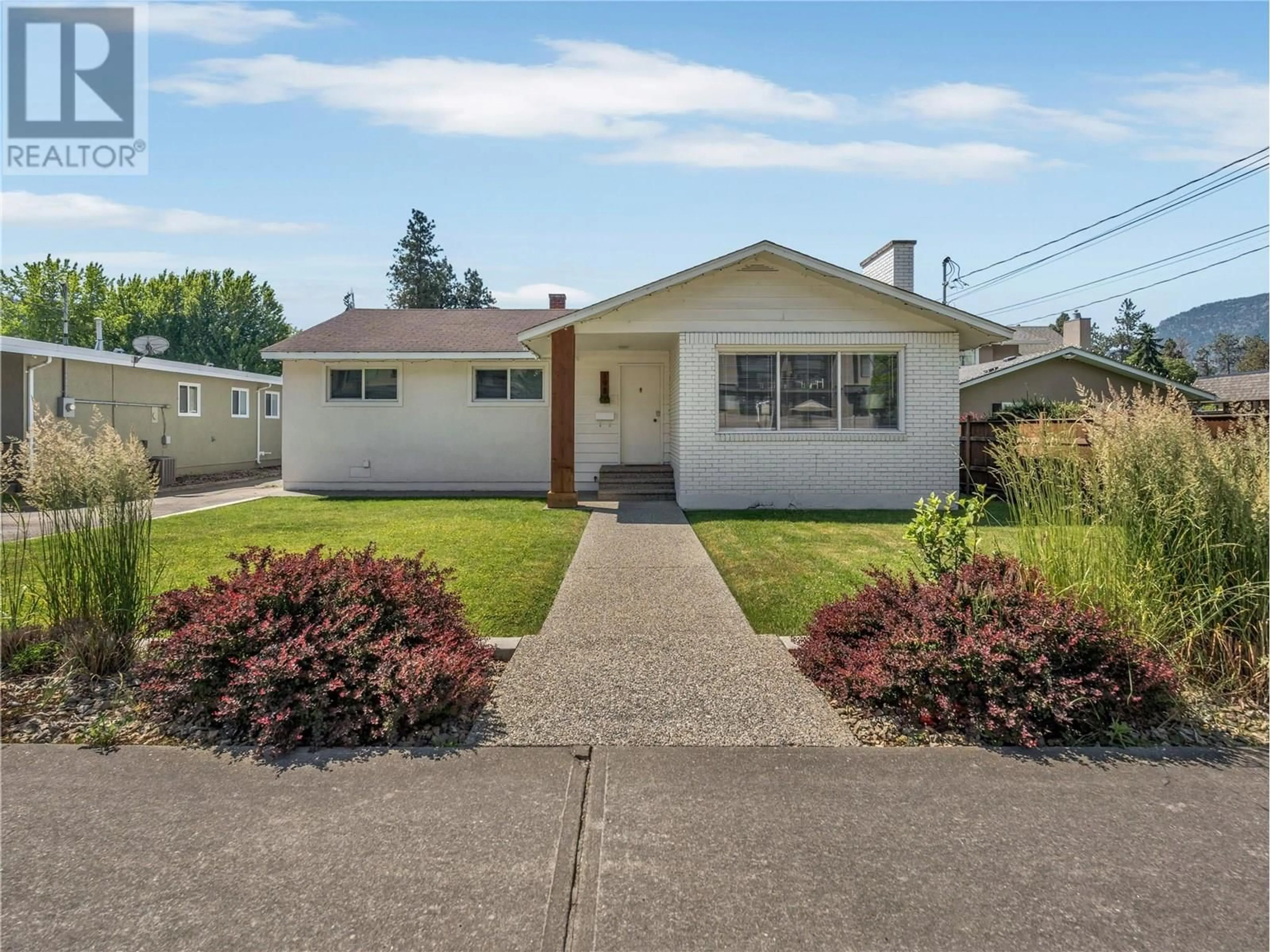Home with vinyl exterior material, street for 198 YORKTON AVENUE, Penticton British Columbia V2A3V2