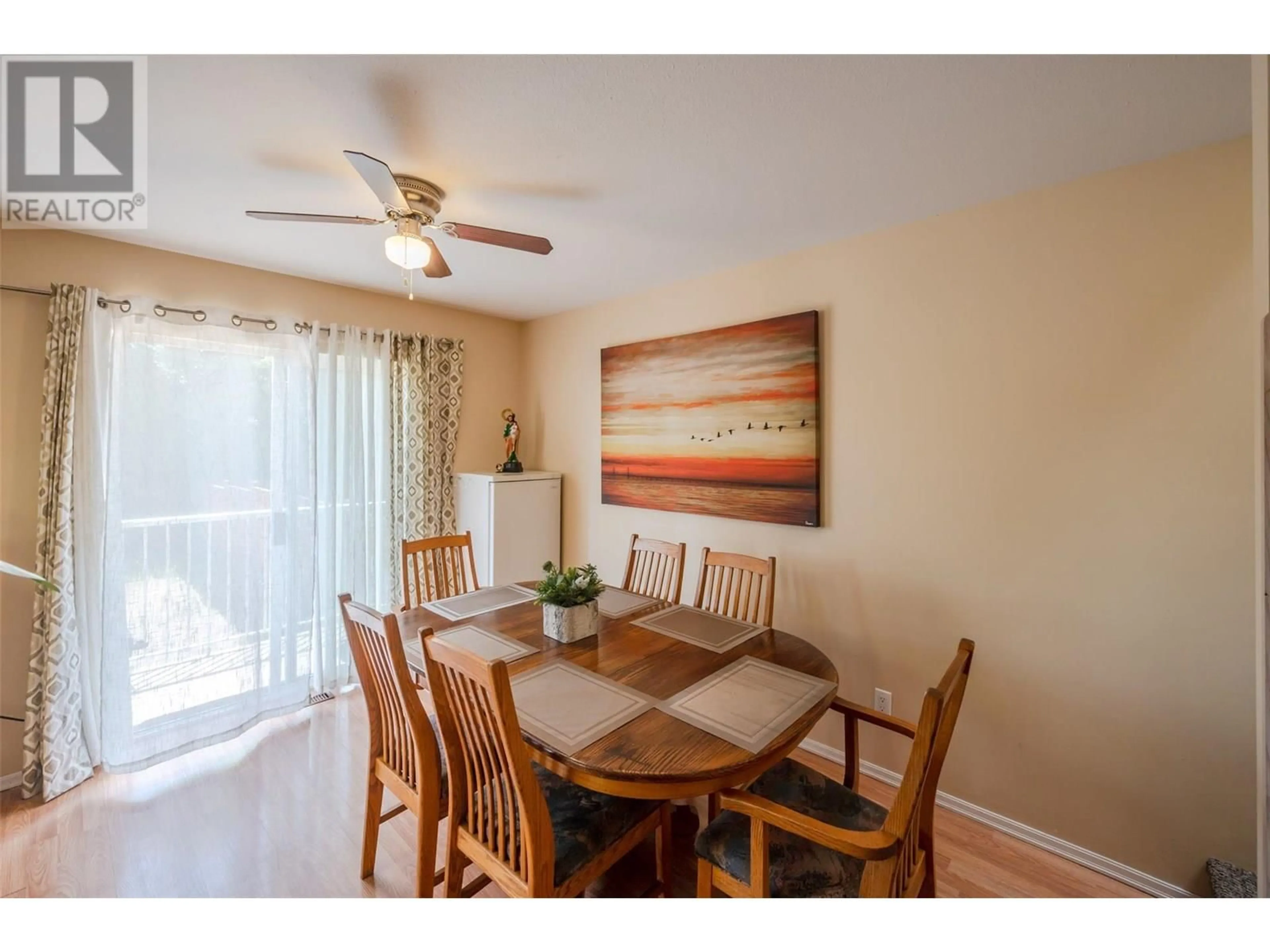 Dining room, wood/laminate floor for 105 - 7915 HESPELER ROAD, Summerland British Columbia V0H1Z4