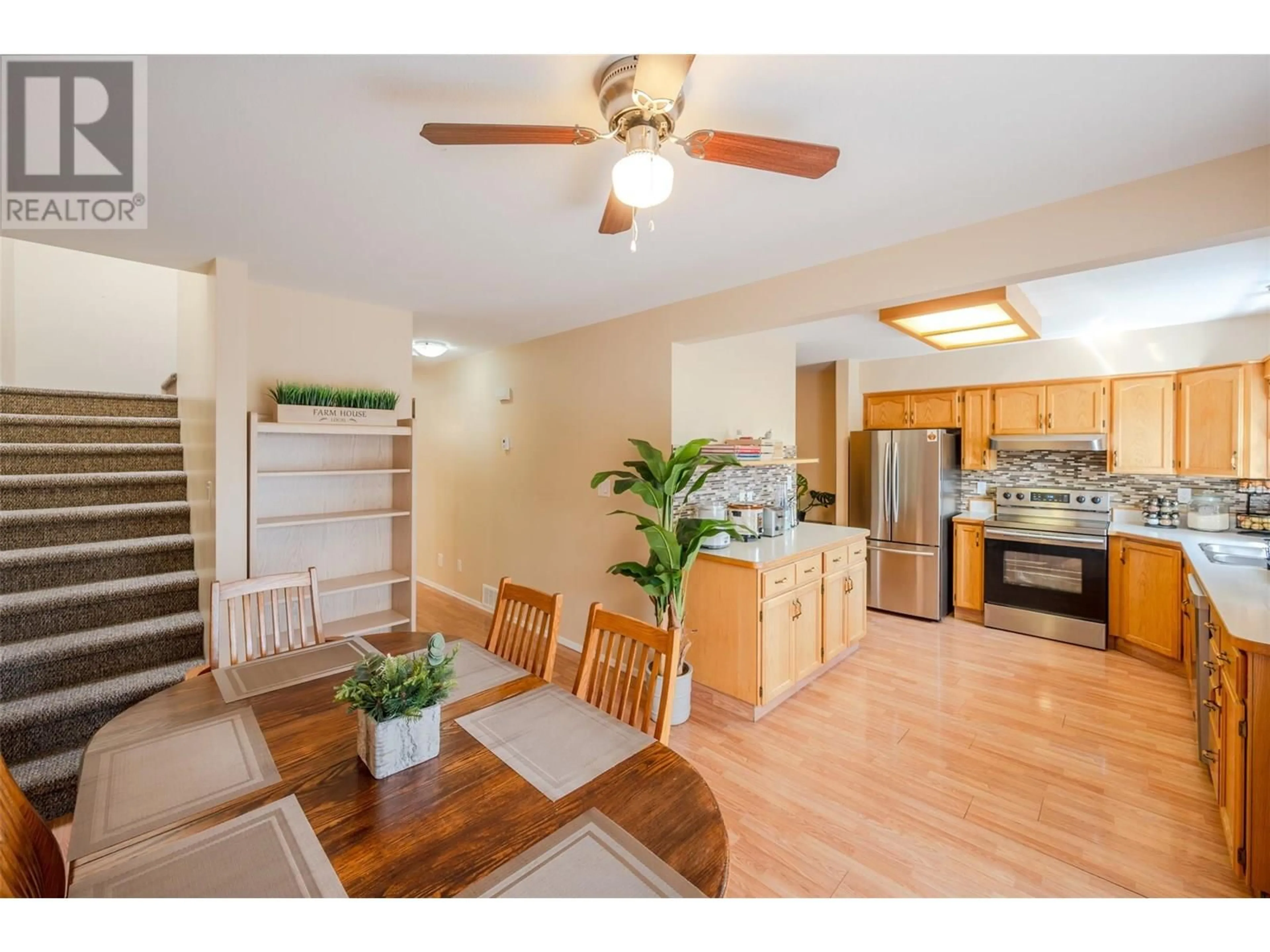 Open concept kitchen, wood/laminate floor for 105 - 7915 HESPELER ROAD, Summerland British Columbia V0H1Z4