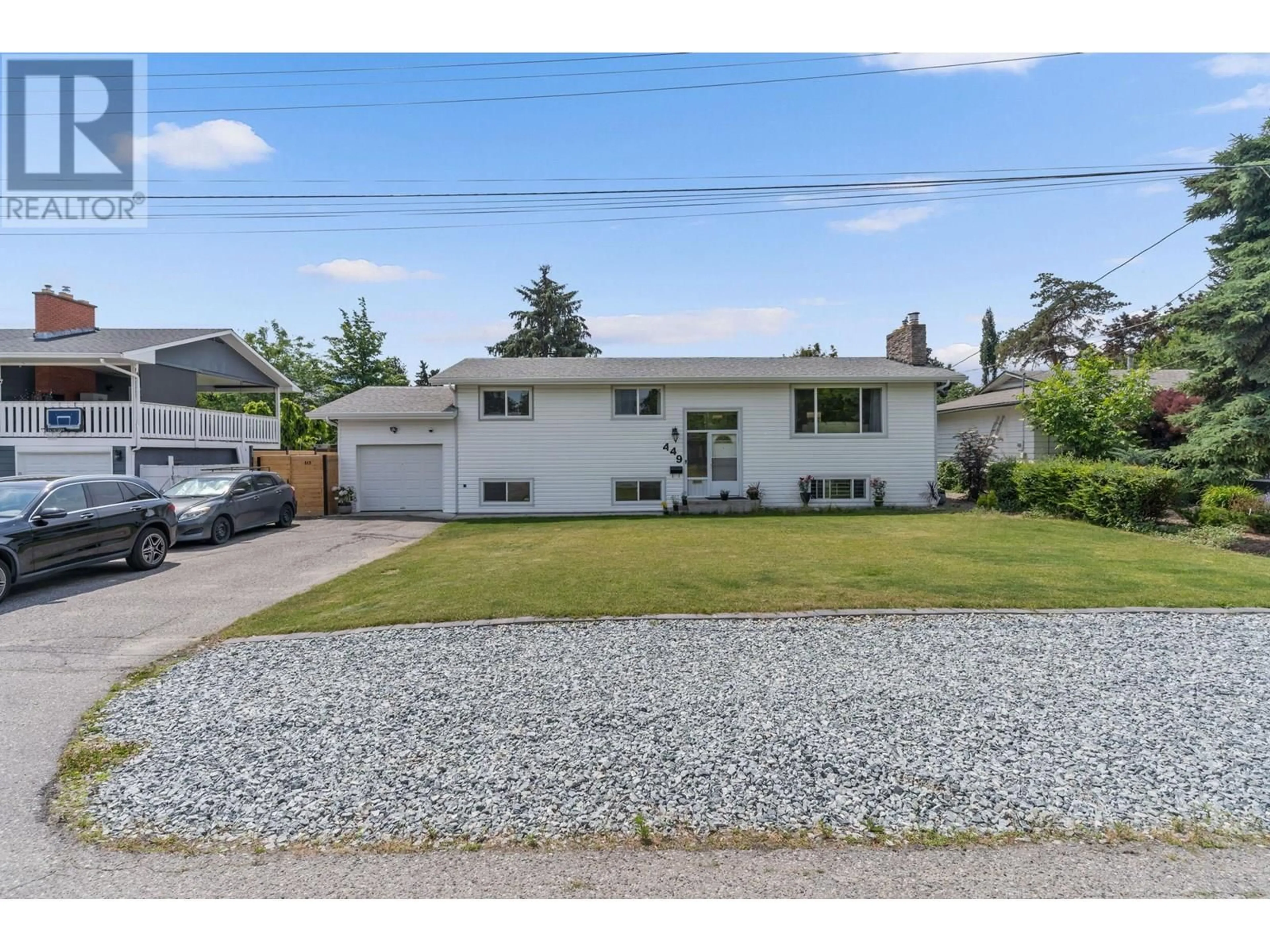 A pic from outside/outdoor area/front of a property/back of a property/a pic from drone, street for 449 BARKLEY ROAD, Kelowna British Columbia V1W1E4