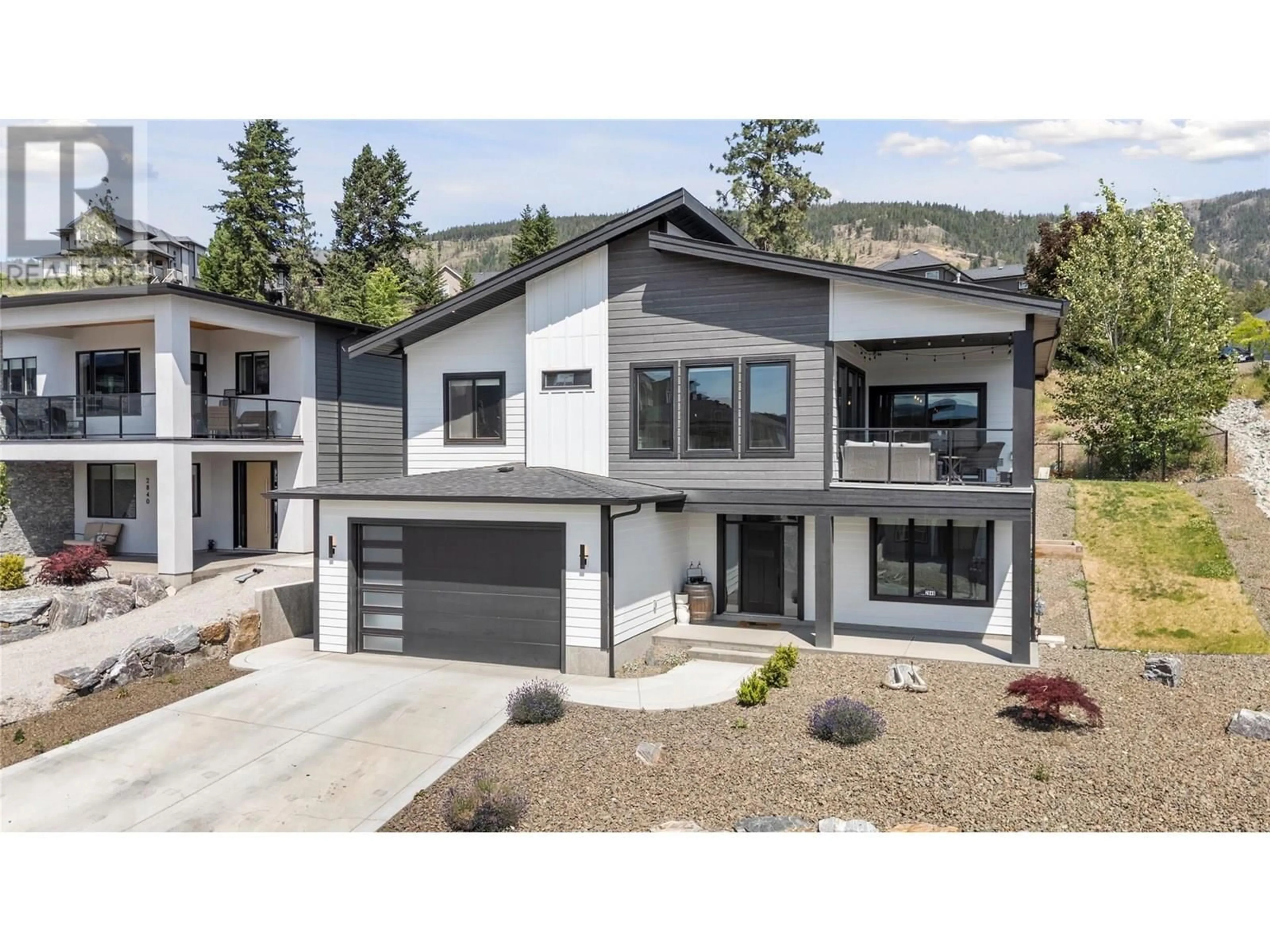 Home with vinyl exterior material, mountain view for 2846 CANYON CREST DRIVE, West Kelowna British Columbia V4T0E3