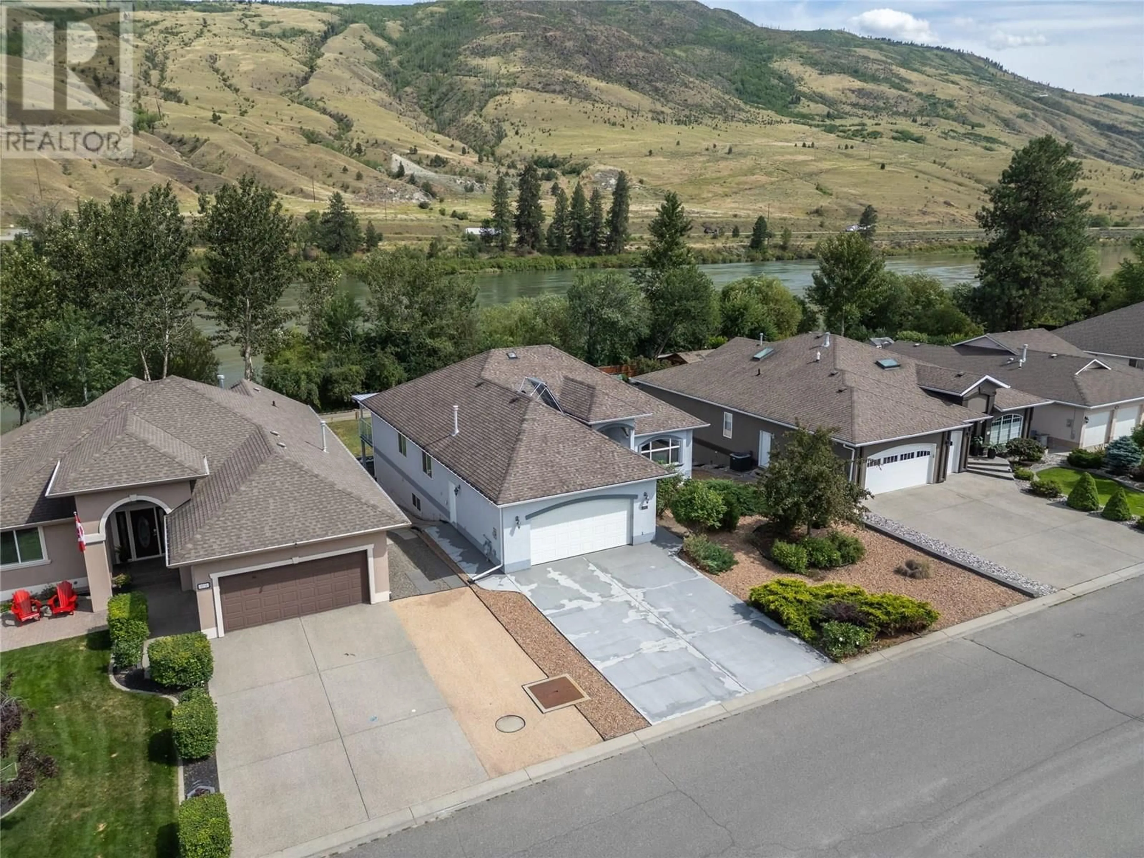 A pic from outside/outdoor area/front of a property/back of a property/a pic from drone, mountain view for 3727 OVERLANDER DRIVE, Kamloops British Columbia V2B8M4