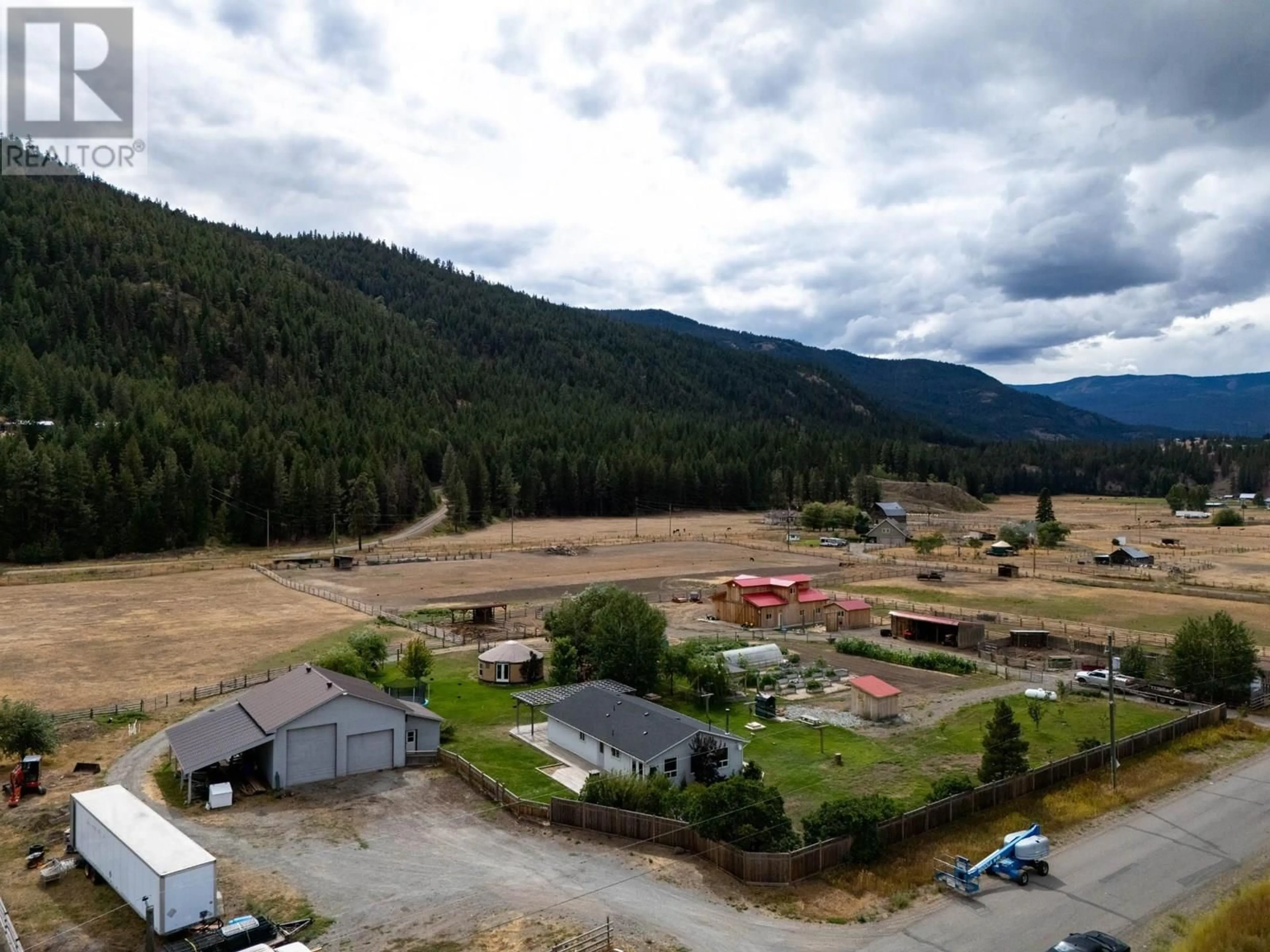 A pic from outside/outdoor area/front of a property/back of a property/a pic from drone, mountain view for 1688 NICOLLS ROAD, Merritt British Columbia V1K1N7