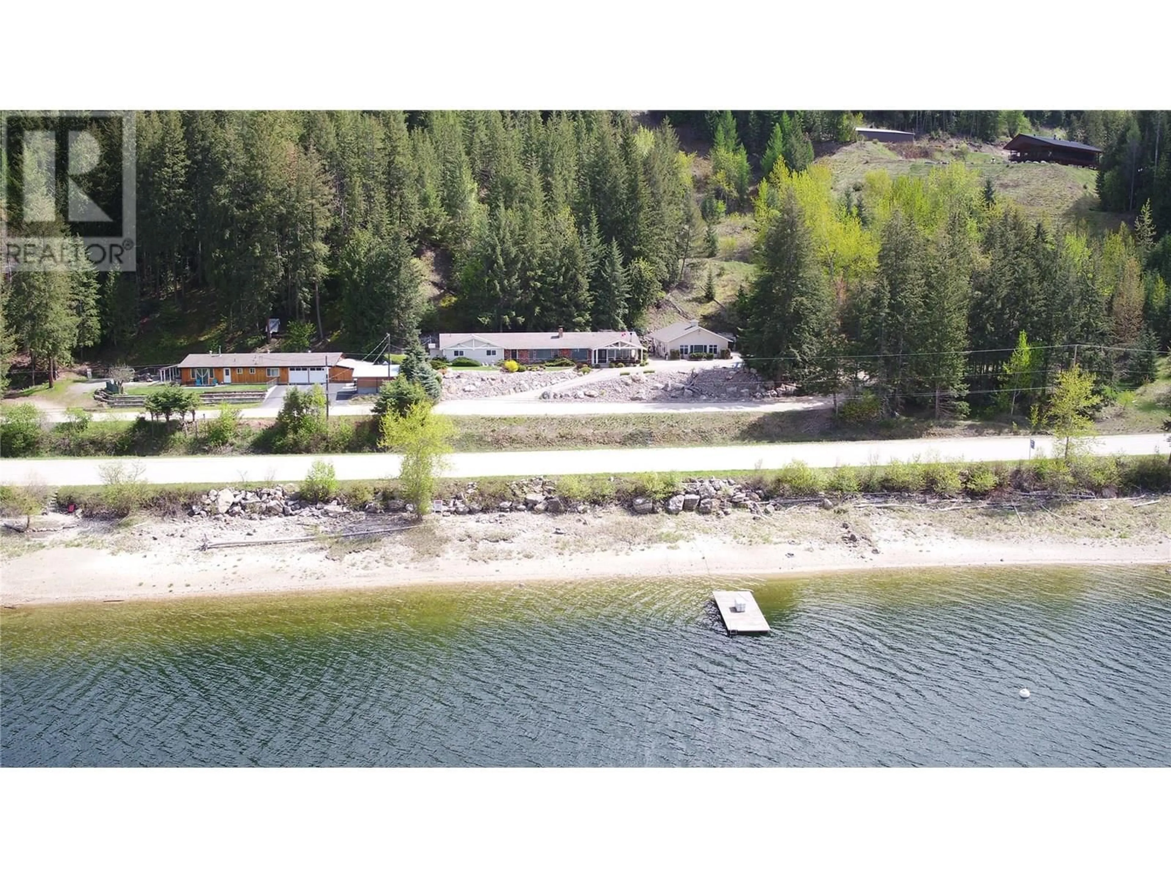 A pic from outside/outdoor area/front of a property/back of a property/a pic from drone, water/lake/river/ocean view for 9178 CLANCY FRONTAGE ROAD, Mara British Columbia V0E2K0