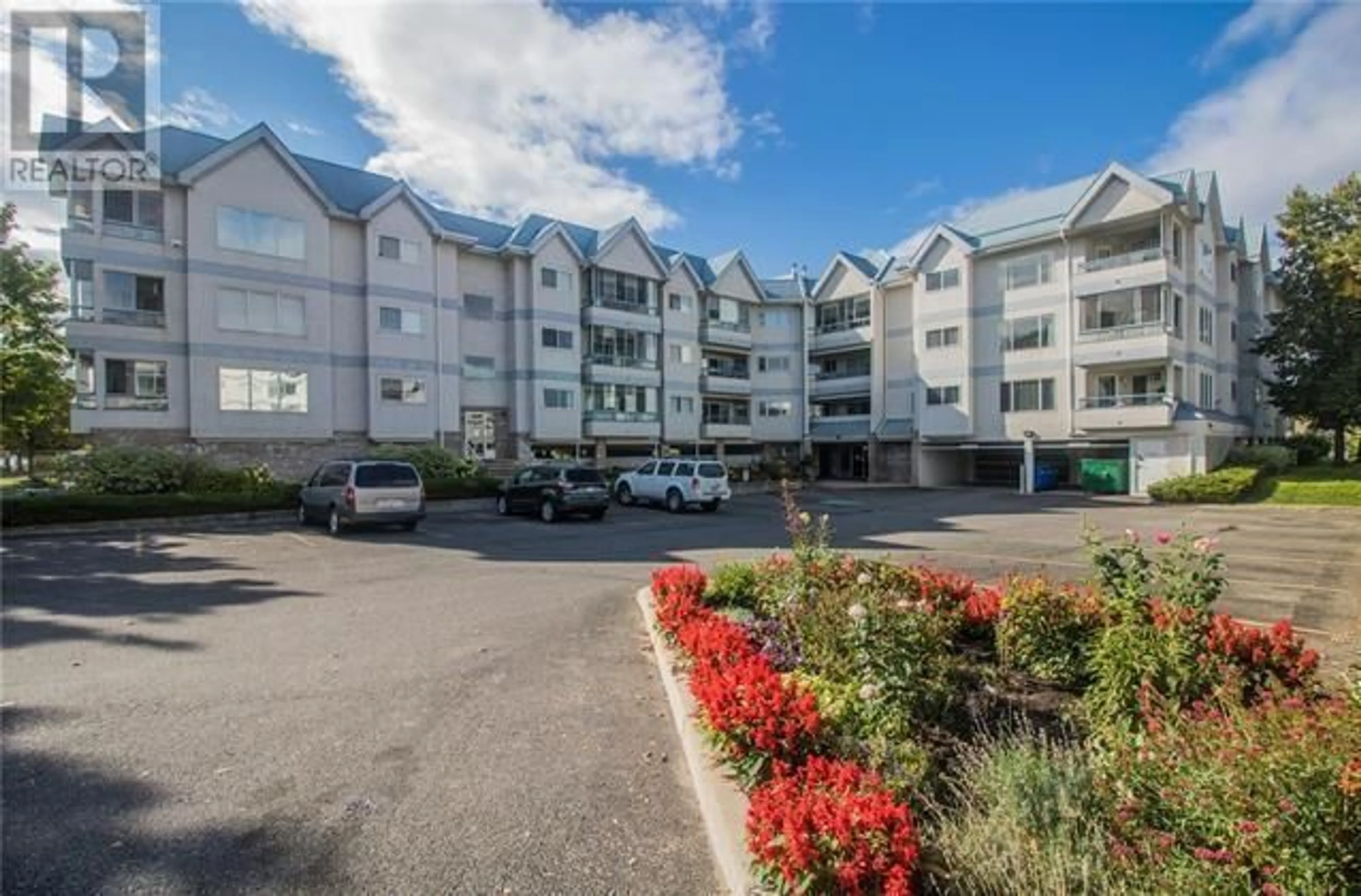 A pic from outside/outdoor area/front of a property/back of a property/a pic from drone, mountain view for 111 - 180 HOLLYWOOD ROAD, Kelowna British Columbia V1X6Y9