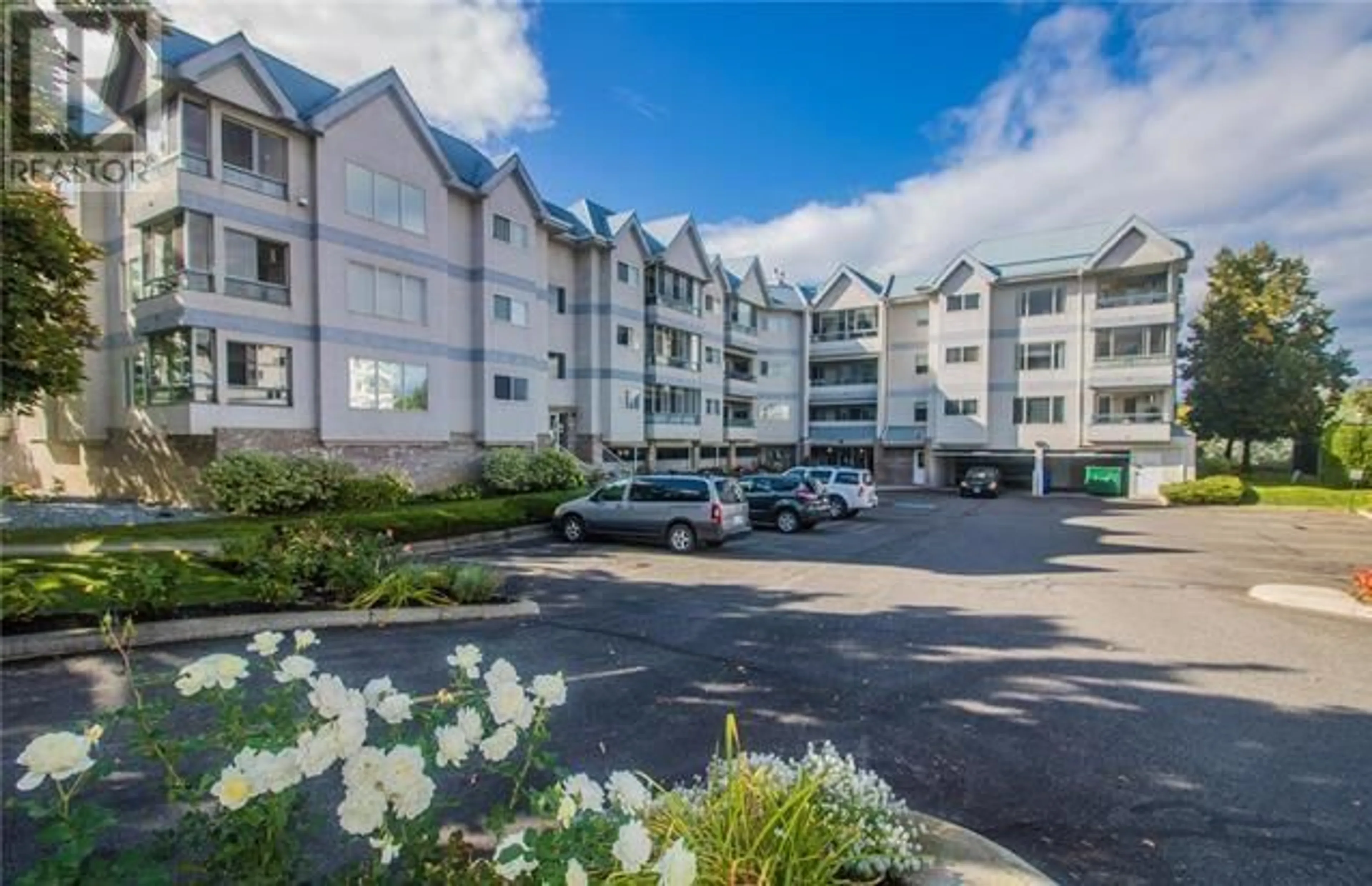 A pic from outside/outdoor area/front of a property/back of a property/a pic from drone, mountain view for 111 - 180 HOLLYWOOD ROAD, Kelowna British Columbia V1X6Y9