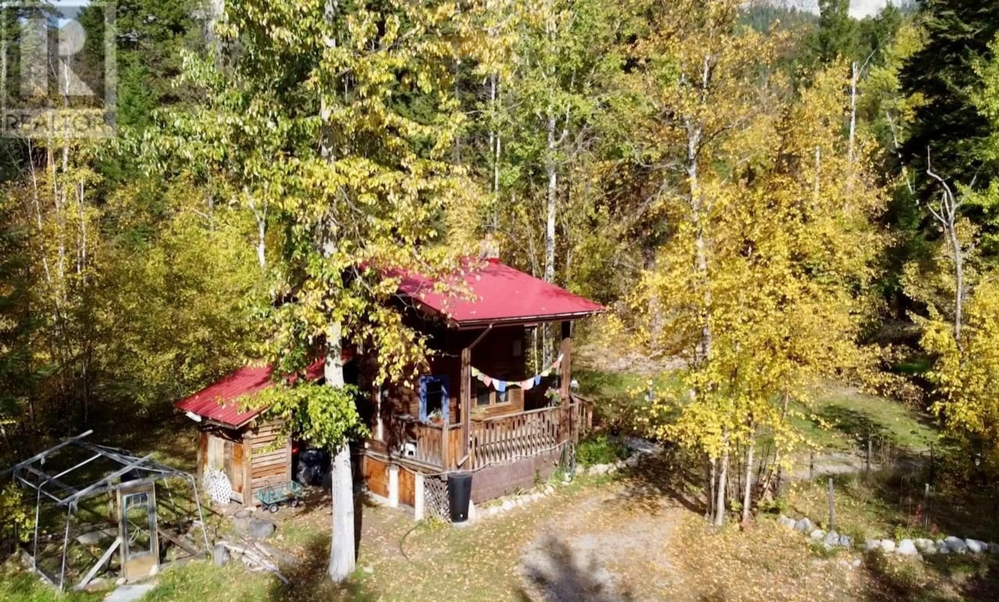 A pic from outside/outdoor area/front of a property/back of a property/a pic from drone, forest/trees view for 1599 CAMPBELL ROAD, Golden British Columbia V0A1H0
