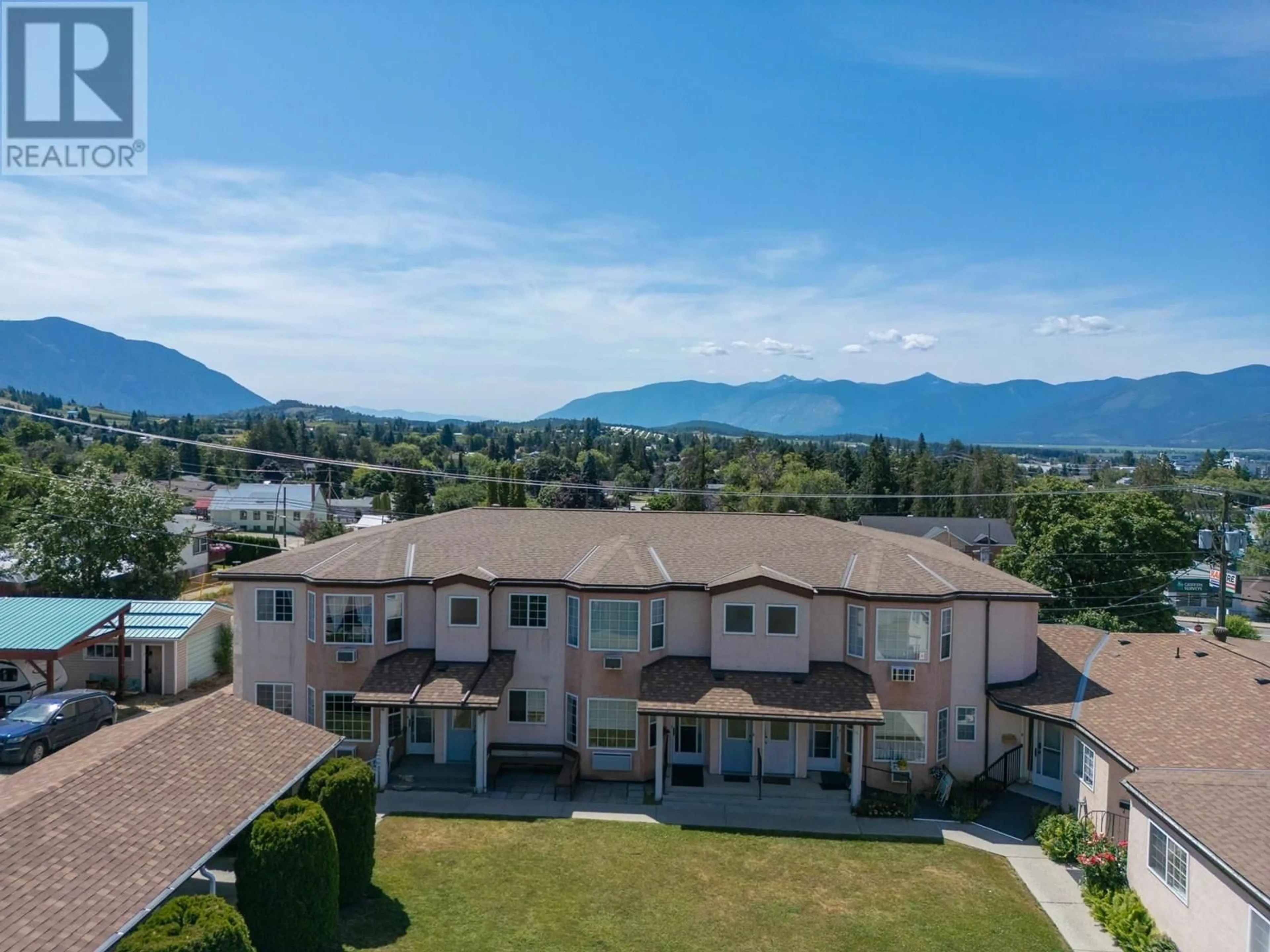 A pic from outside/outdoor area/front of a property/back of a property/a pic from drone, mountain view for 5 - 1907 PINE STREET, Creston British Columbia V0B1G5