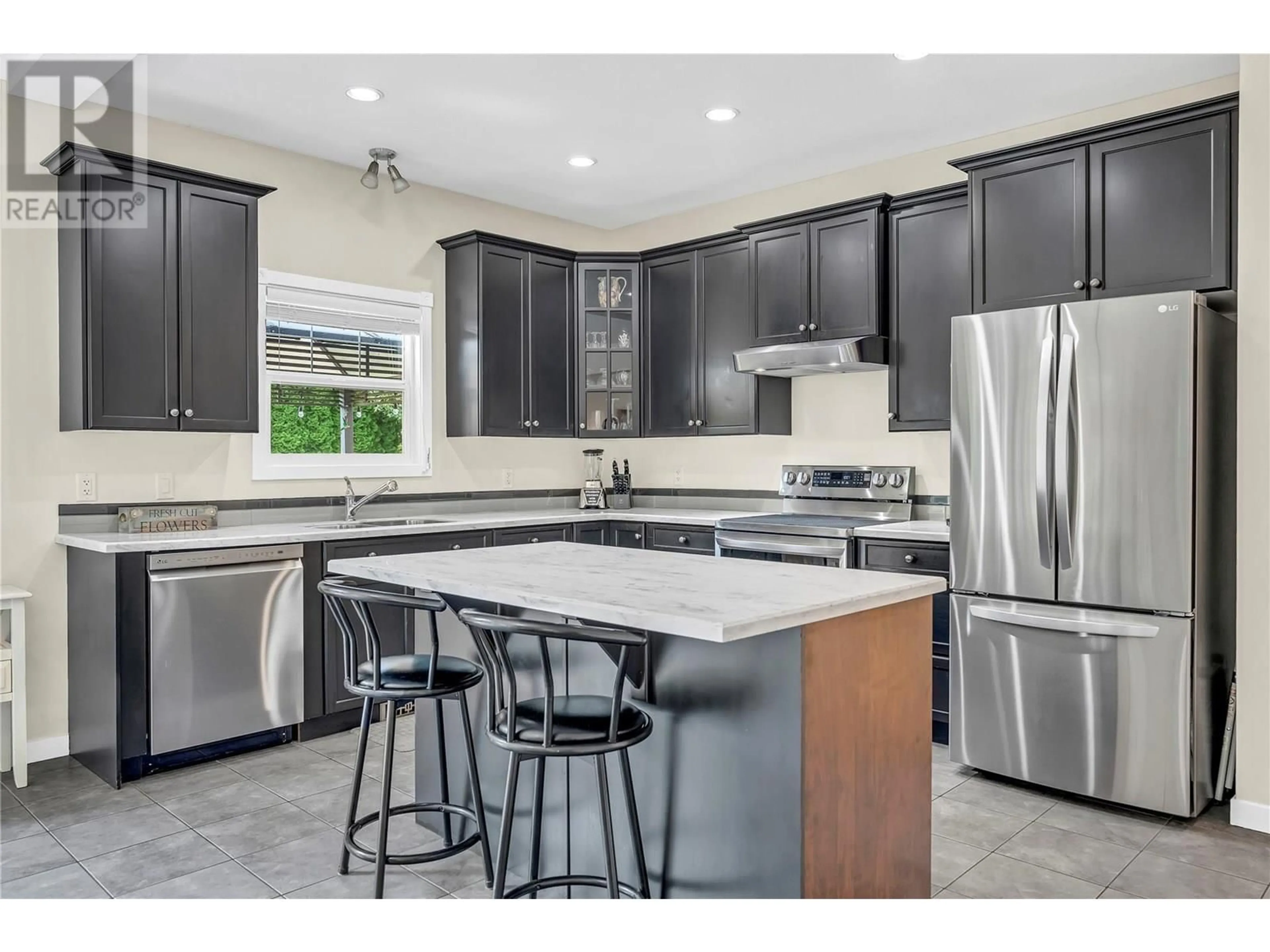 Open concept kitchen, ceramic/tile floor for 137 WALTON CRESCENT, Summerland British Columbia V0H1Z8
