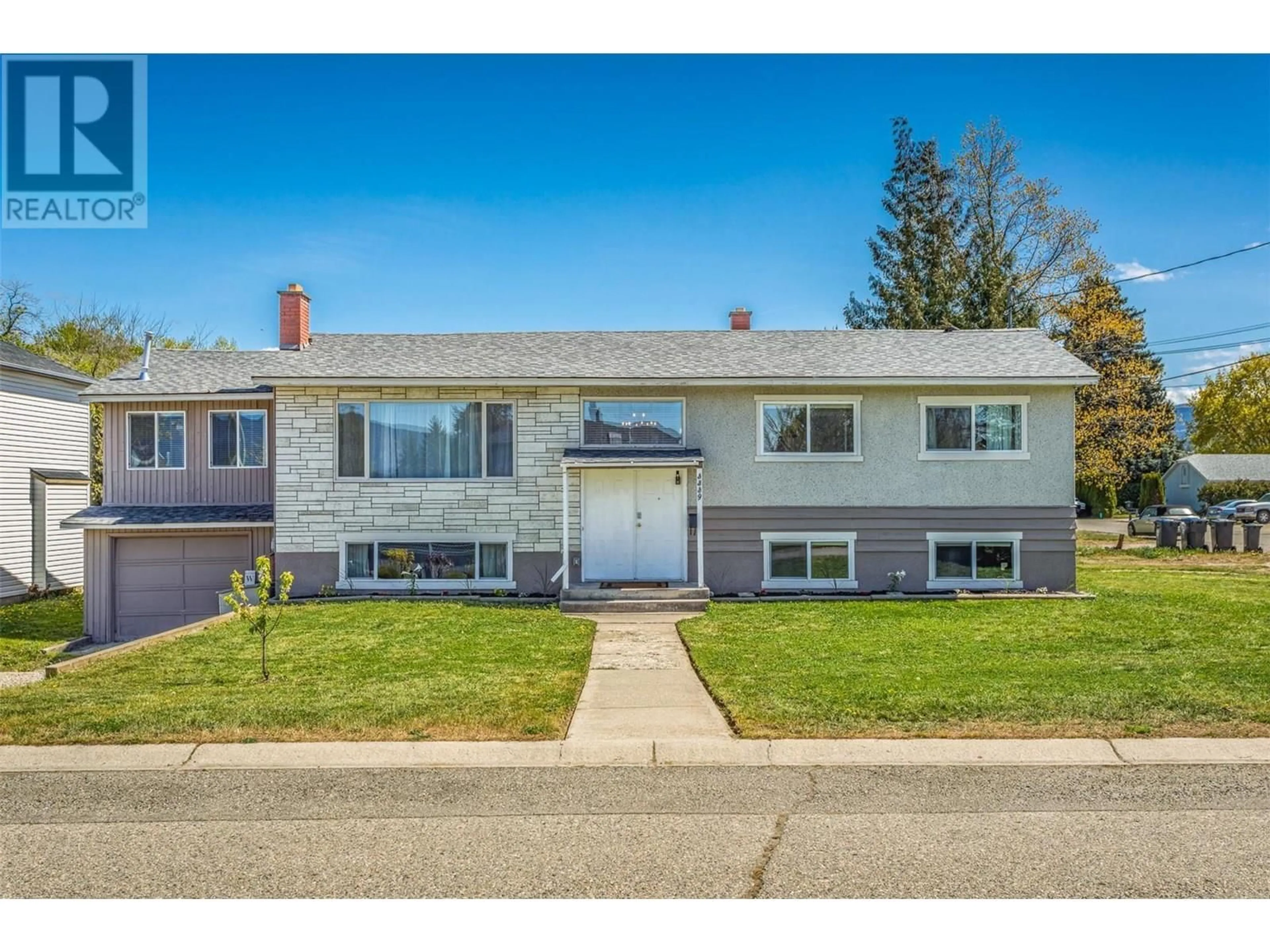 Home with vinyl exterior material, street for 3339 BOTHE ROAD, Kelowna British Columbia V1W3M3