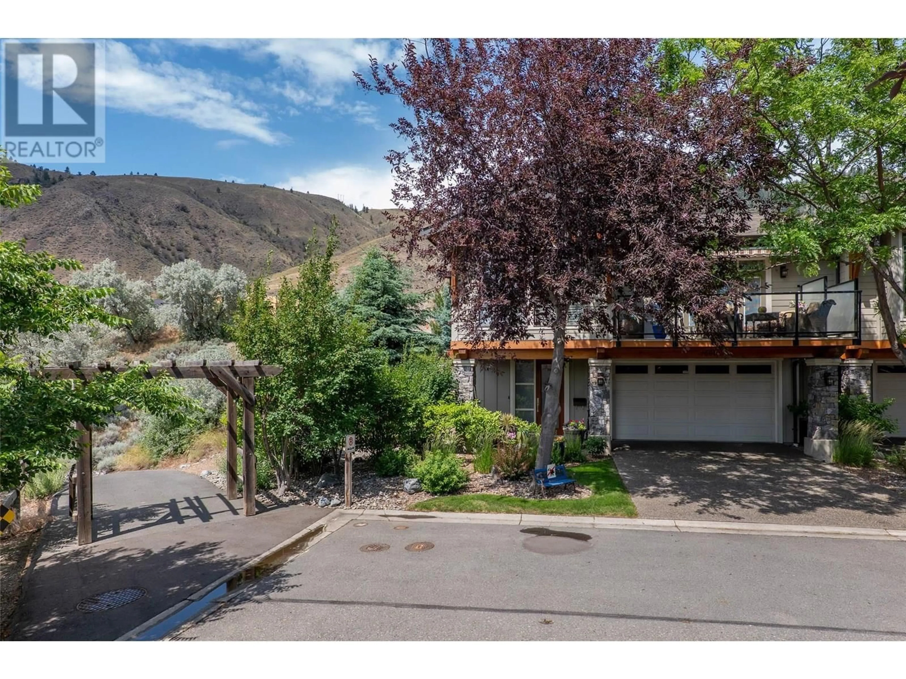A pic from outside/outdoor area/front of a property/back of a property/a pic from drone, mountain view for 1590 GOLF RIDGE DRIVE, Kamloops British Columbia V2H0A5