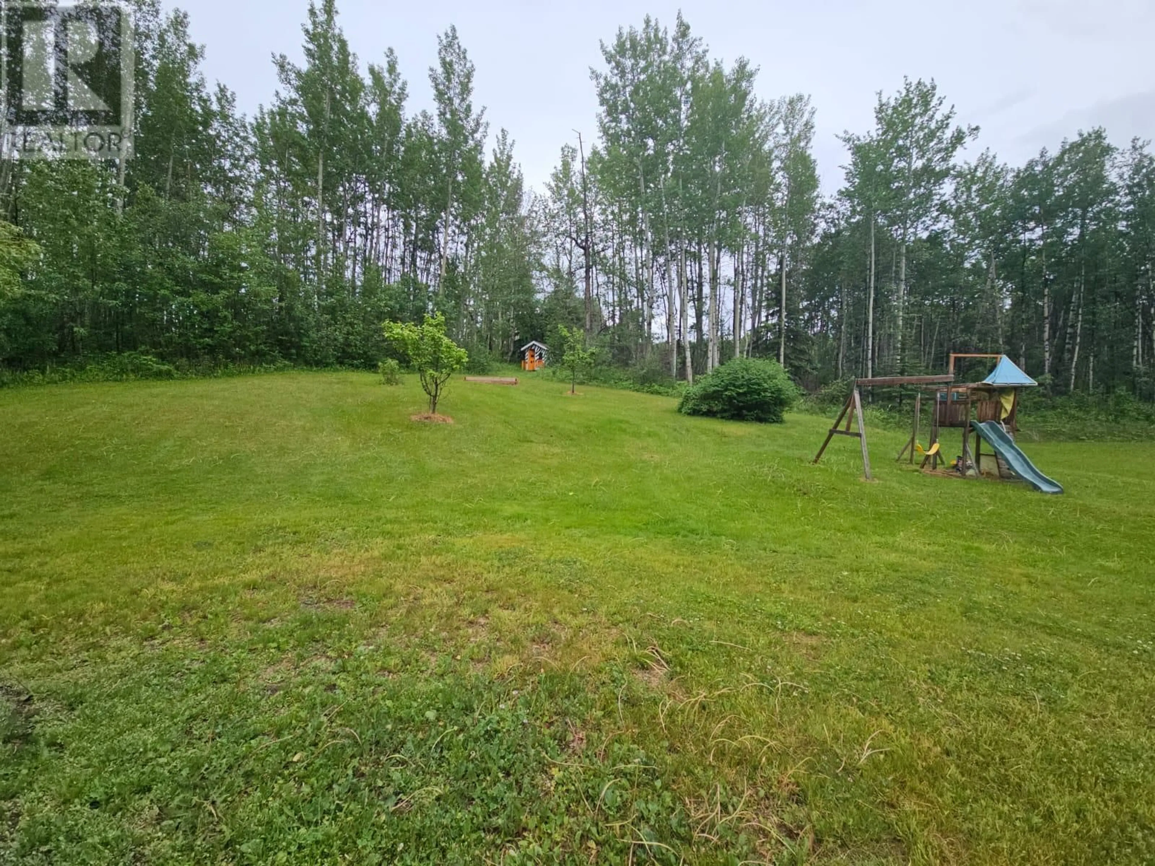 A pic from outside/outdoor area/front of a property/back of a property/a pic from drone, forest/trees view for 5567 BROWNS ROAD, Chetwynd British Columbia V0C1J0