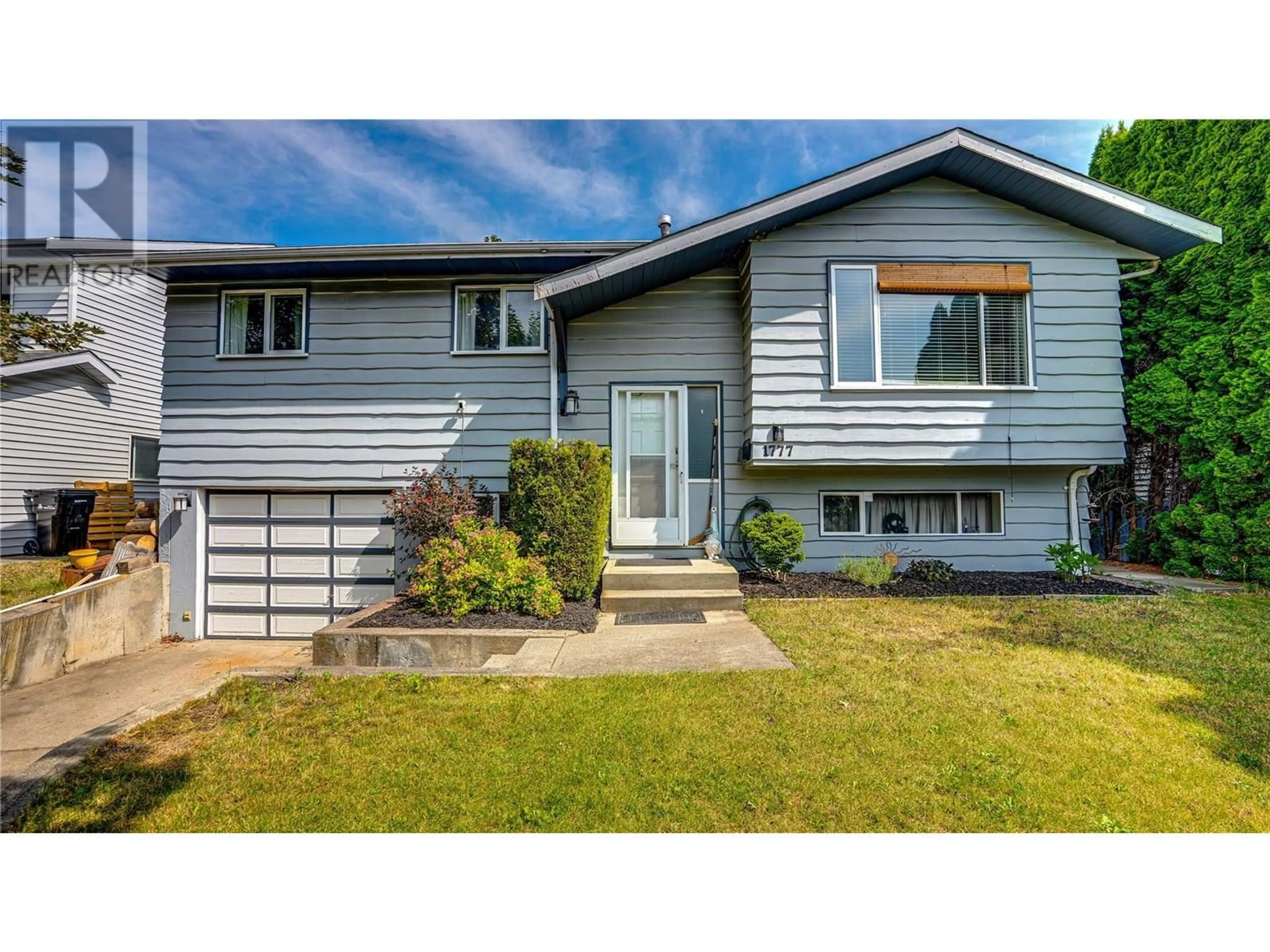 Home with vinyl exterior material, street for 1777 BIGHORN ROAD, Vernon British Columbia V1T8X4