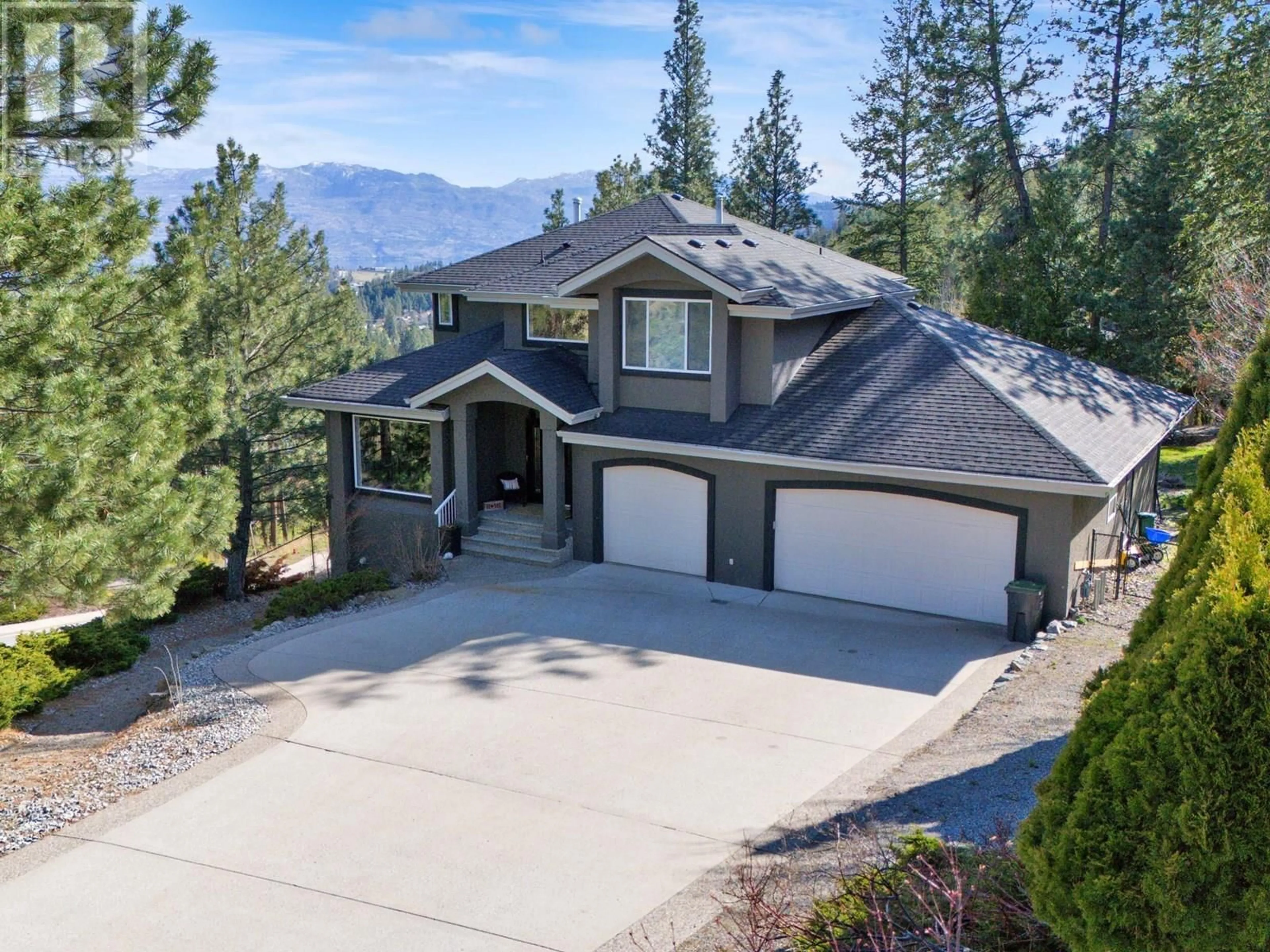 A pic from outside/outdoor area/front of a property/back of a property/a pic from drone, mountain view for 1026 MCPHAIL COURT, West Kelowna British Columbia V1Z3M7