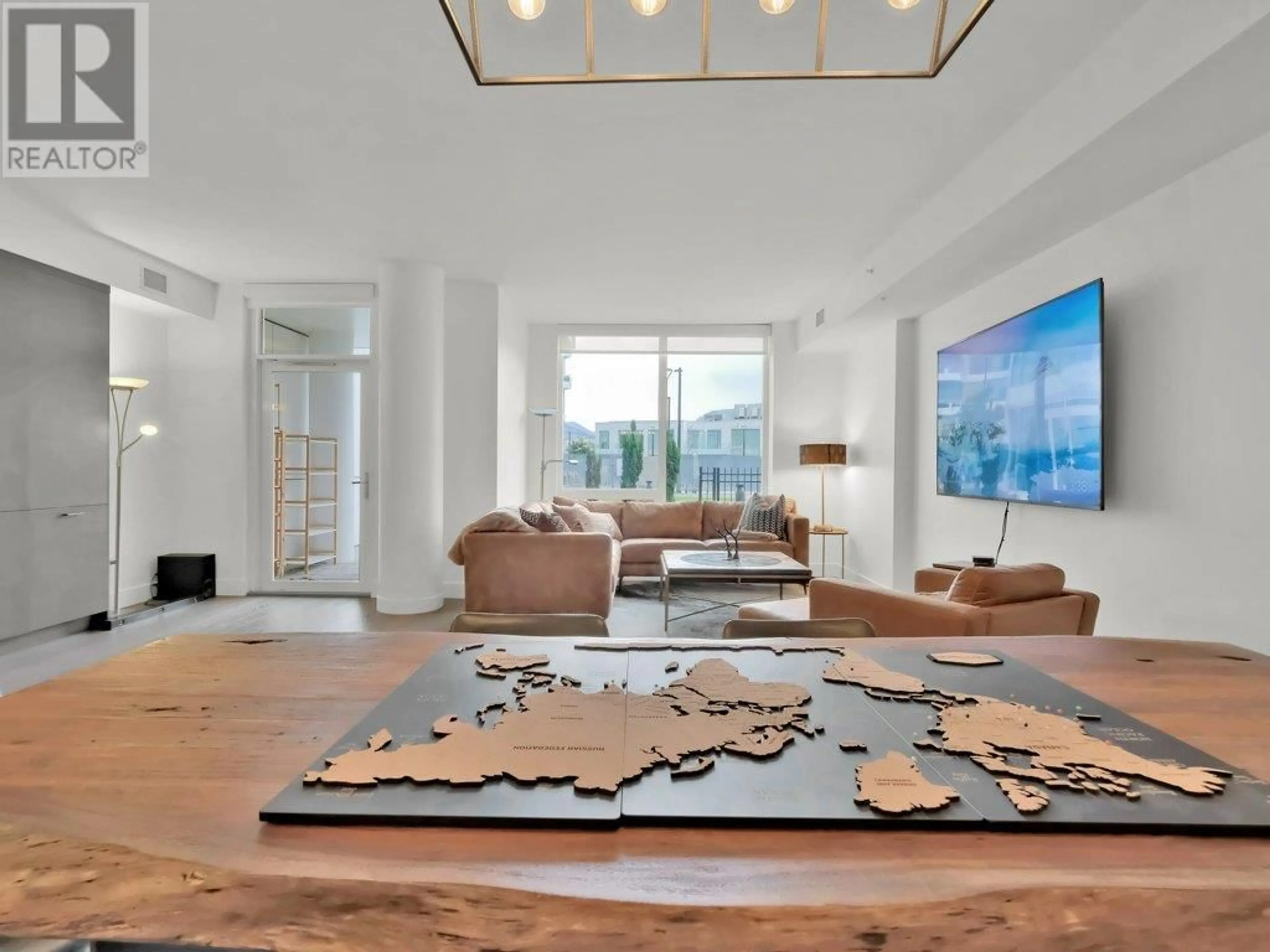 Living room with furniture, unknown for 401 - 1191 SUNSET DRIVE, Kelowna British Columbia V1Y9Z5