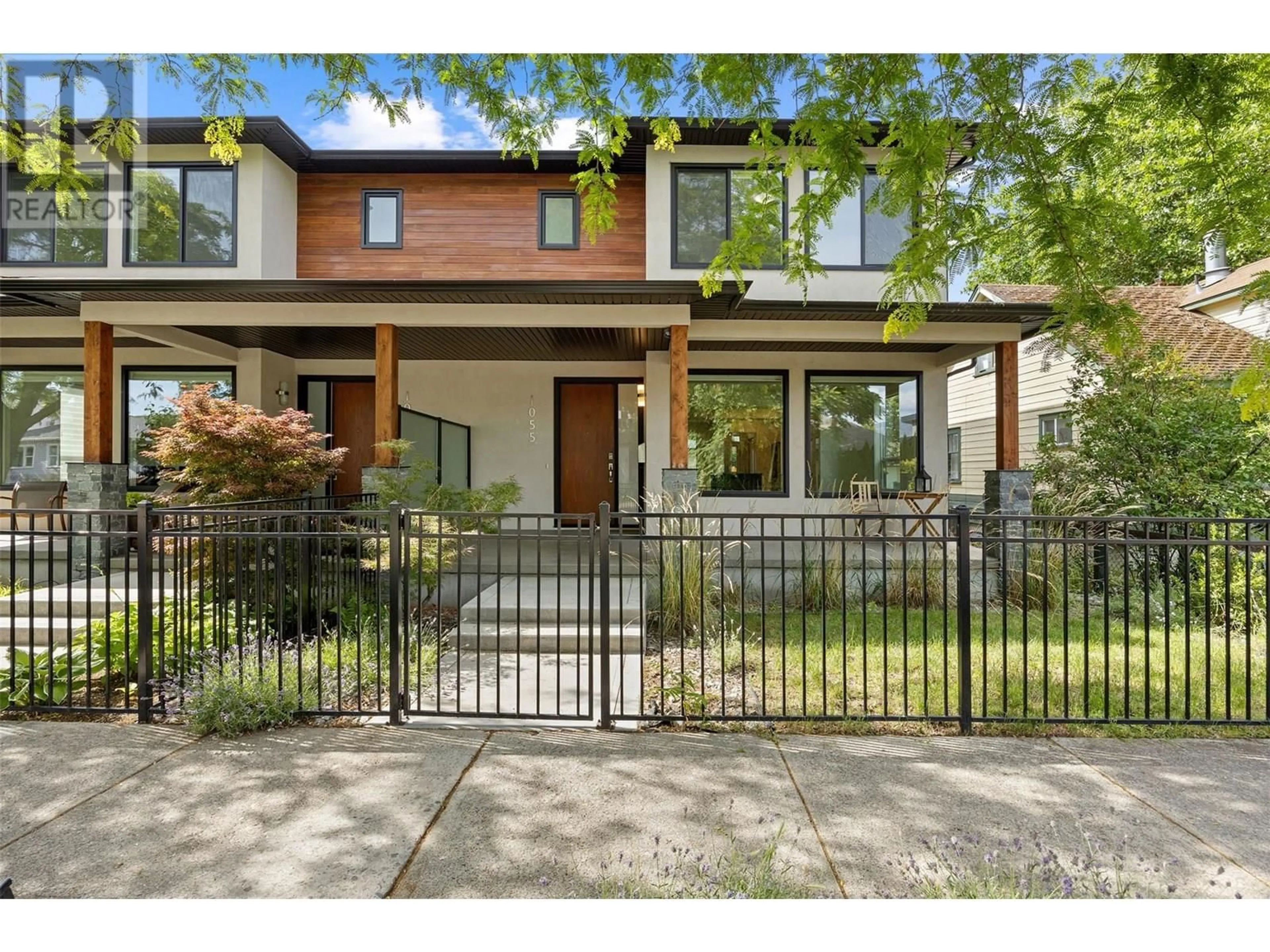Home with brick exterior material, street for 1055 WILSON AVENUE, Kelowna British Columbia V1Y6Y4