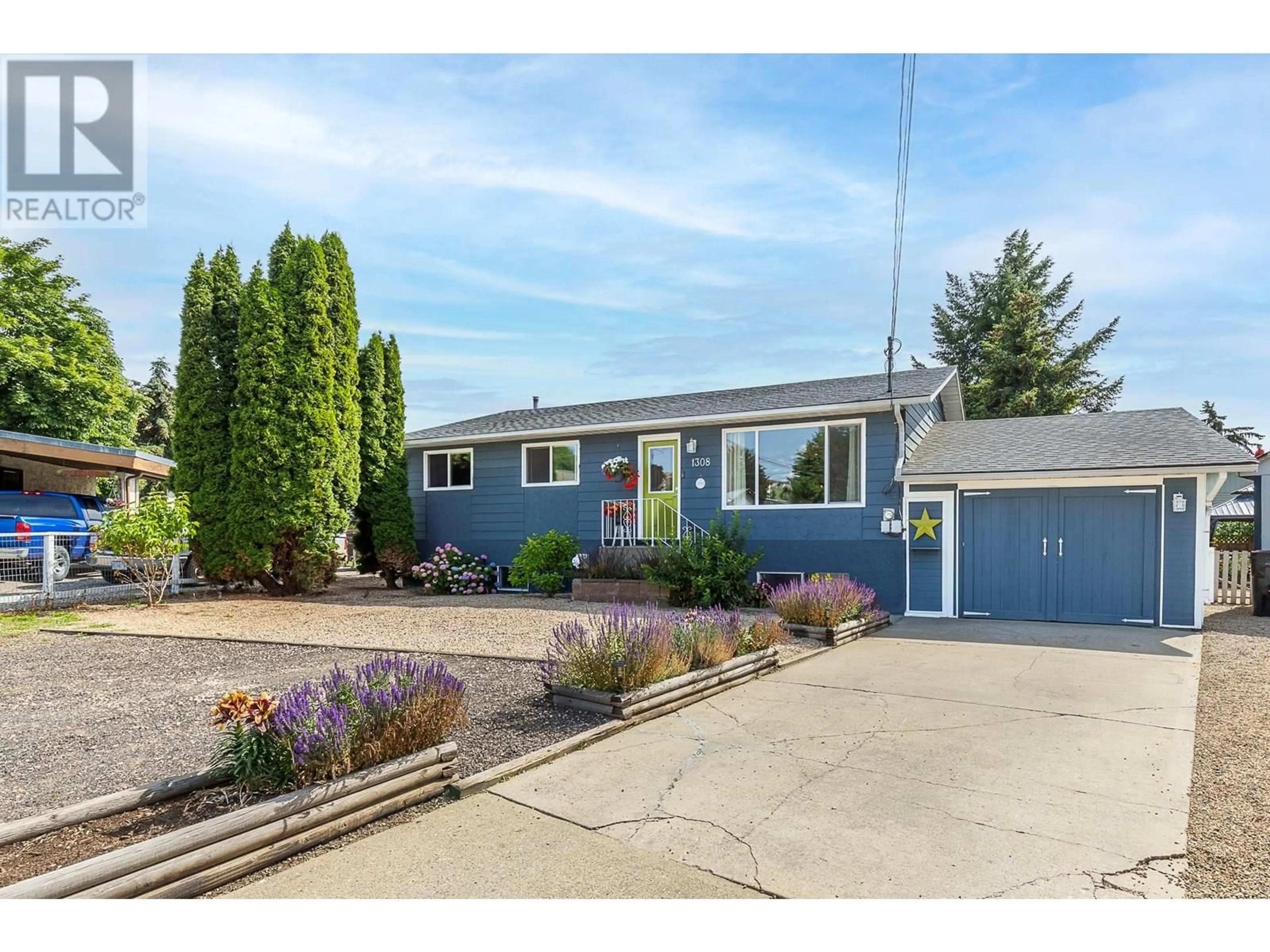 Home with vinyl exterior material, street for 1308 42A STREET, Vernon British Columbia V1T7T6