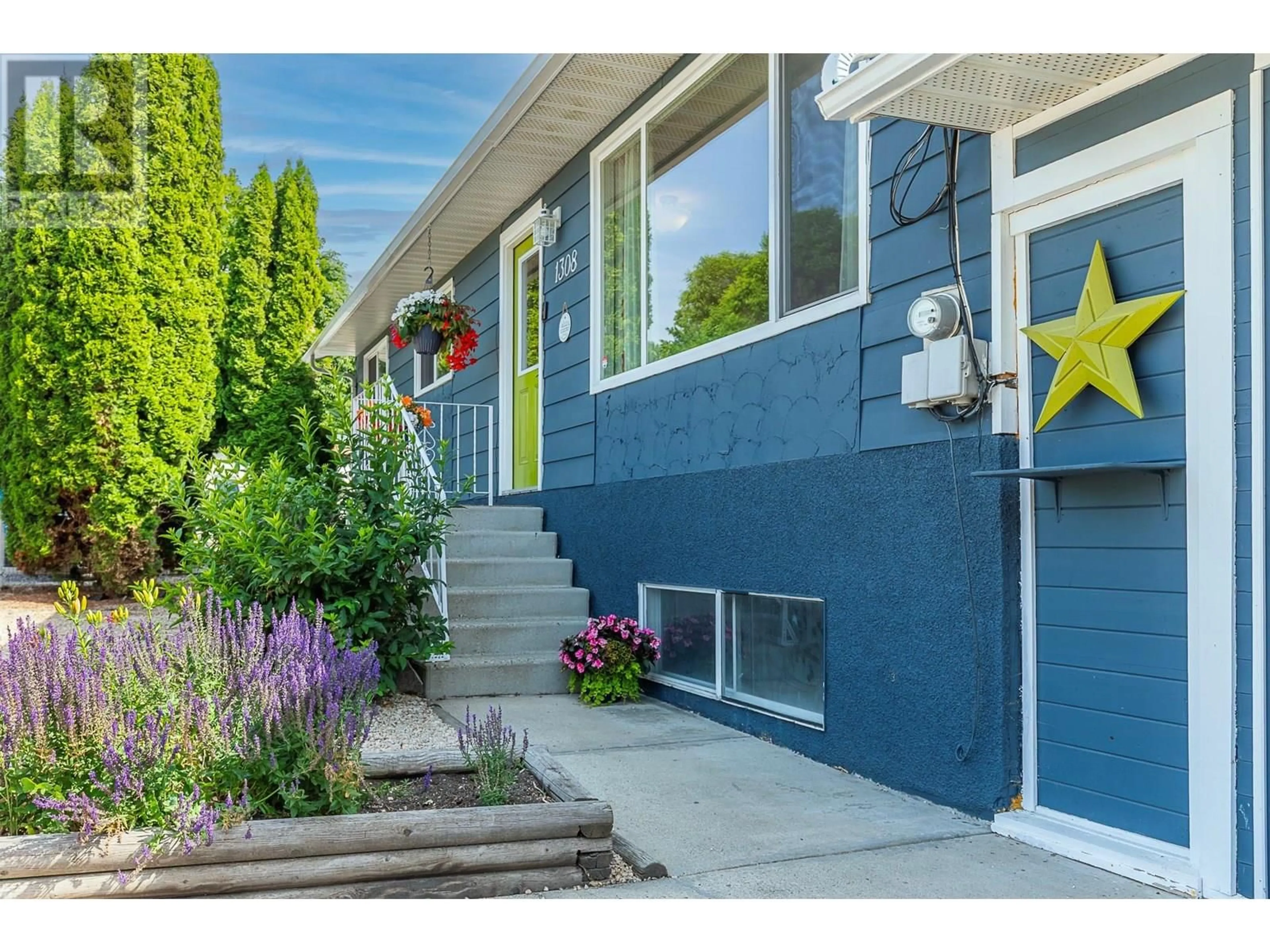 Home with vinyl exterior material, street for 1308 42A STREET, Vernon British Columbia V1T7T6