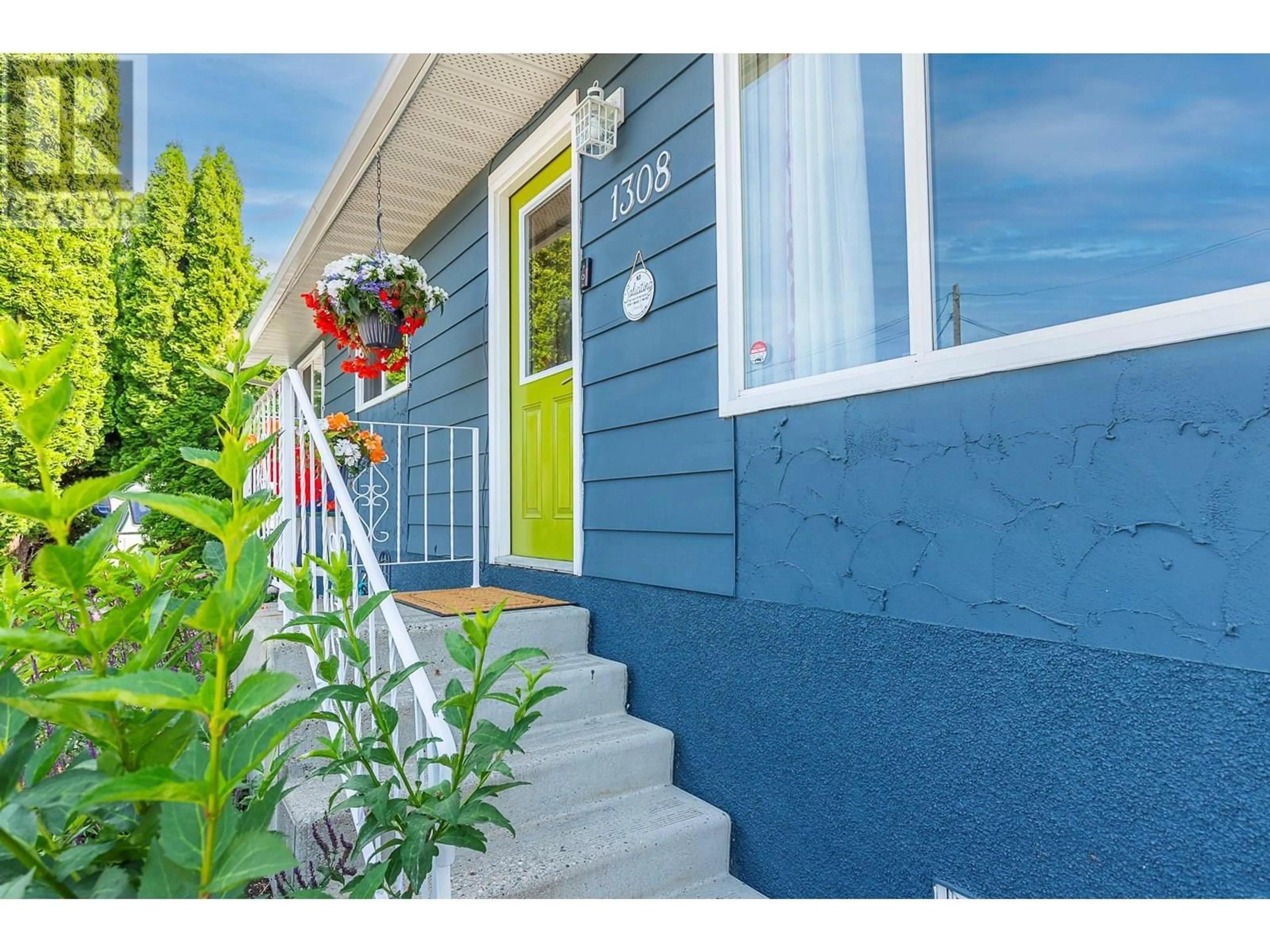 Home with vinyl exterior material, street for 1308 42A STREET, Vernon British Columbia V1T7T6