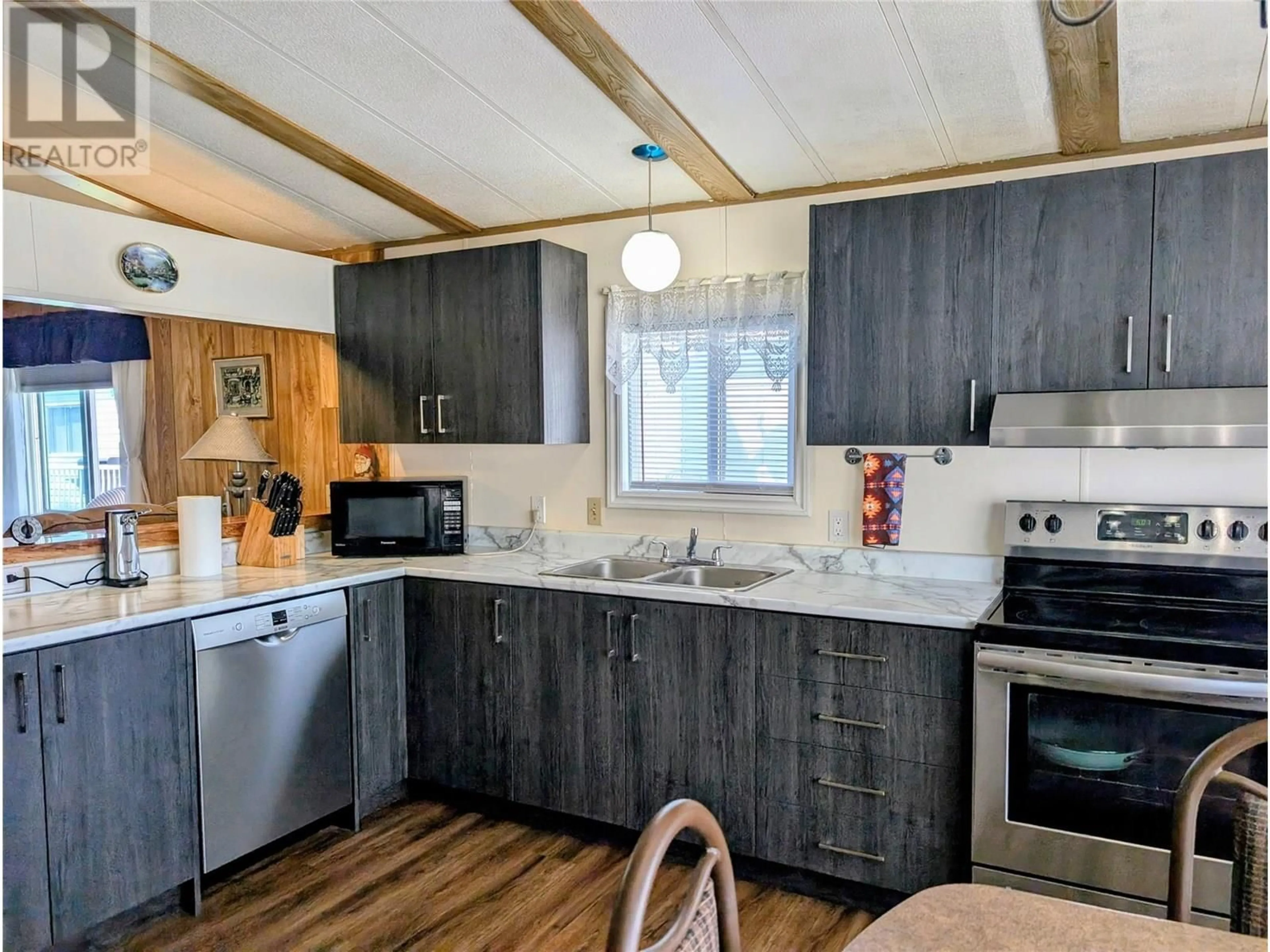 Standard kitchen, wood/laminate floor for 122 - 1401 NICOLA AVENUE, Merritt British Columbia V1K1L8