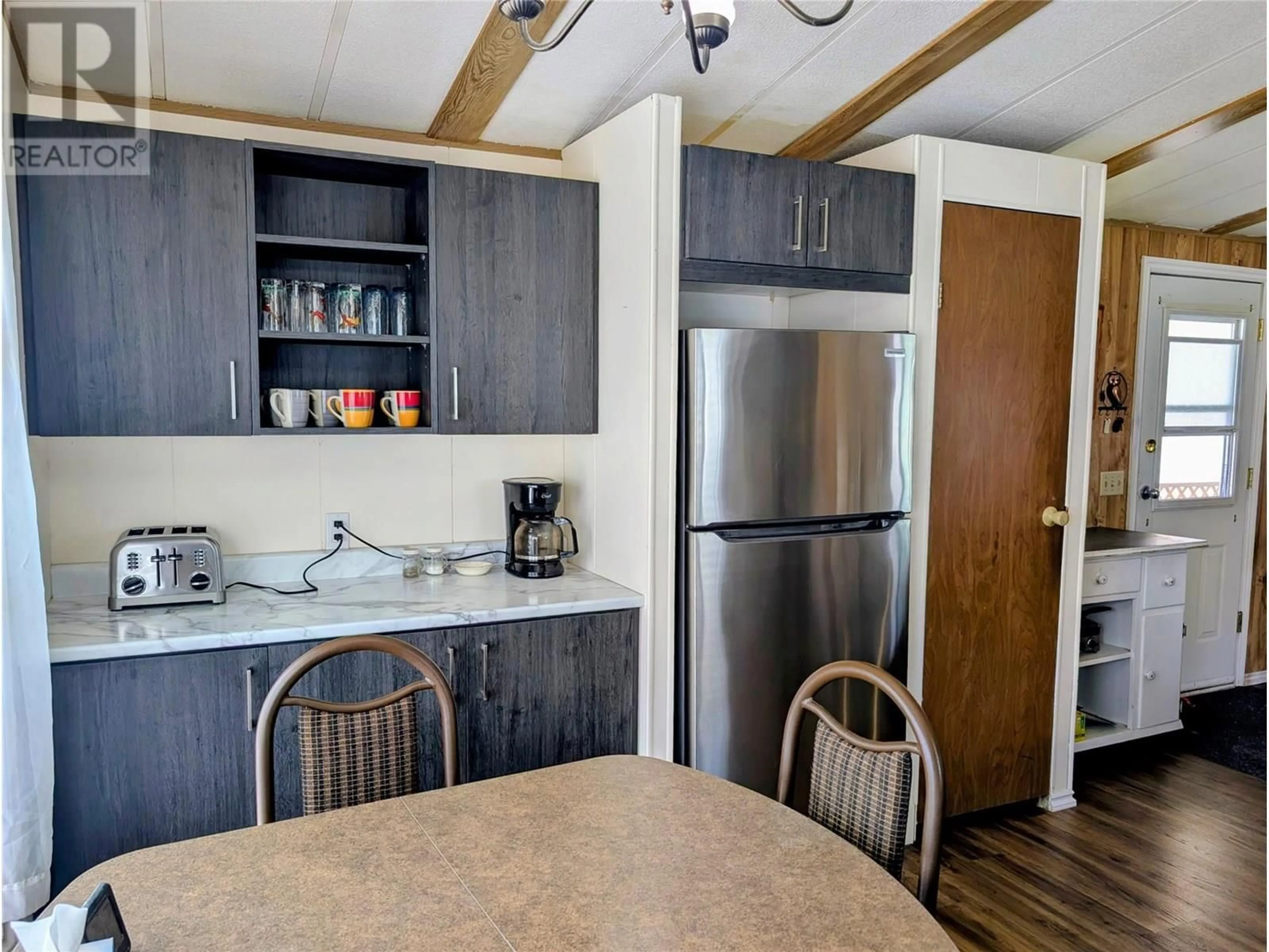 Standard kitchen, wood/laminate floor for 122 - 1401 NICOLA AVENUE, Merritt British Columbia V1K1L8