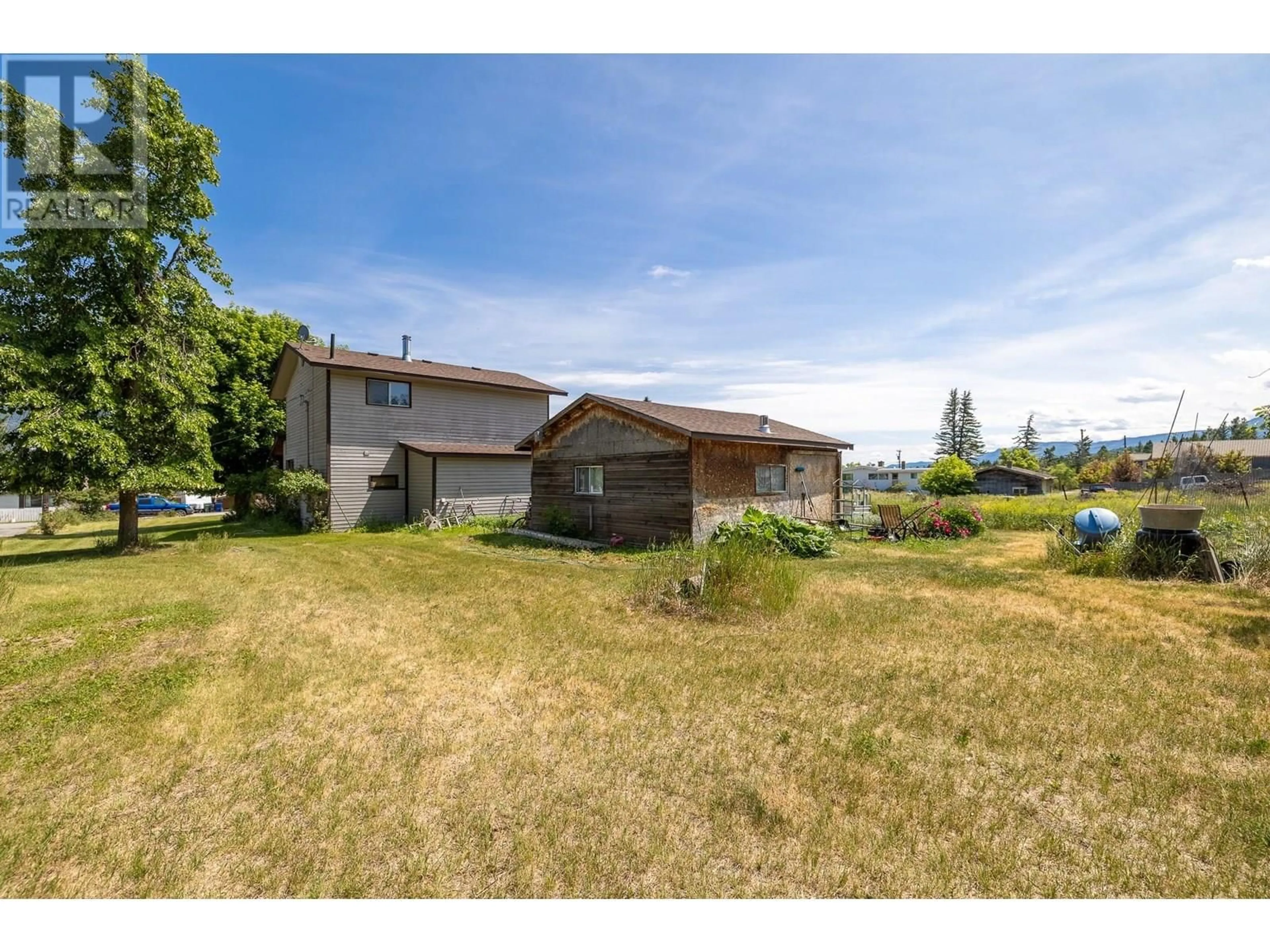 A pic from outside/outdoor area/front of a property/back of a property/a pic from drone, unknown for 1012 11 AVENUE, Invermere British Columbia V0A1K4