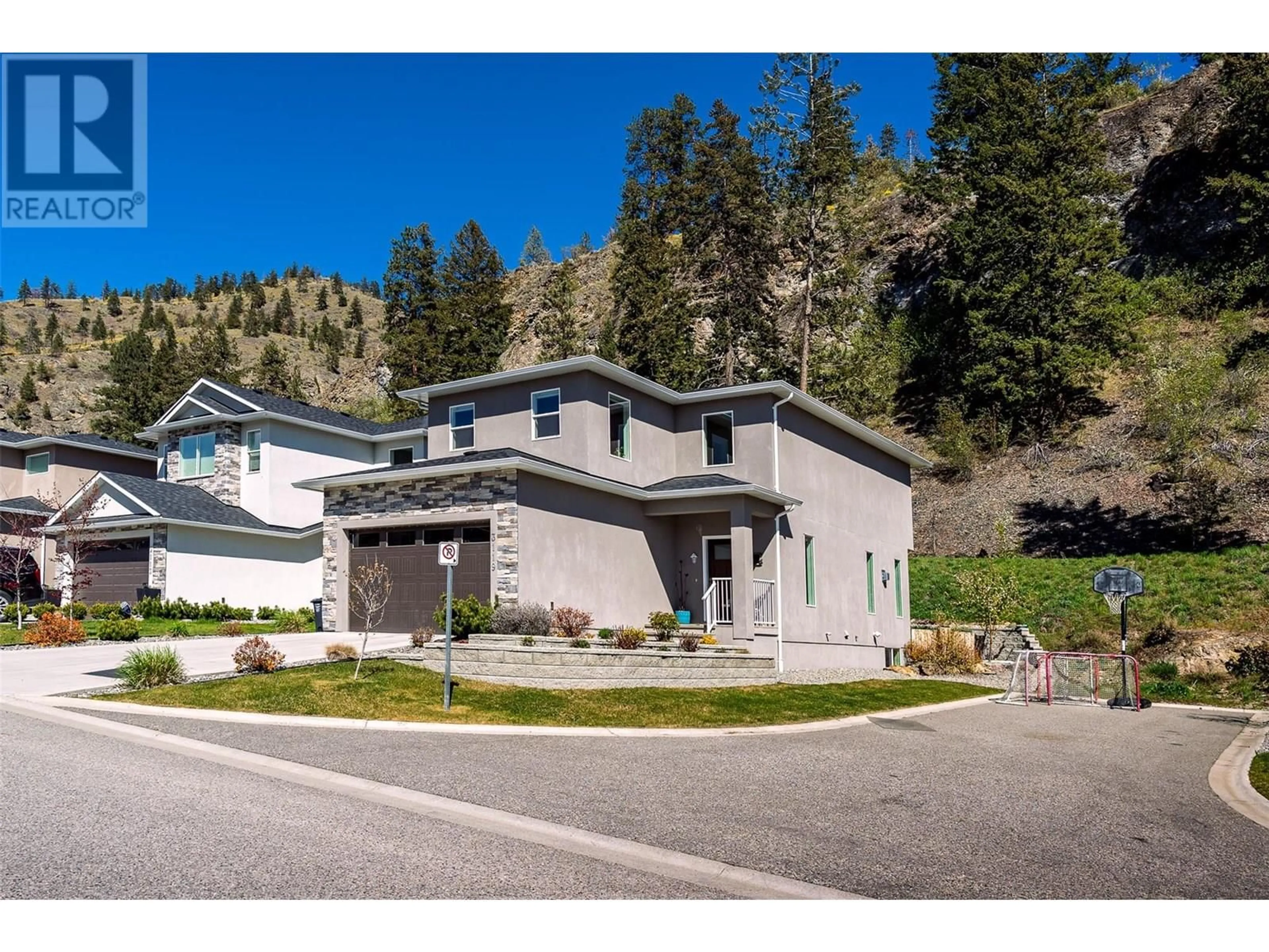 Home with vinyl exterior material, mountain view for 3119 RIESLING WAY, West Kelowna British Columbia V4T3M7