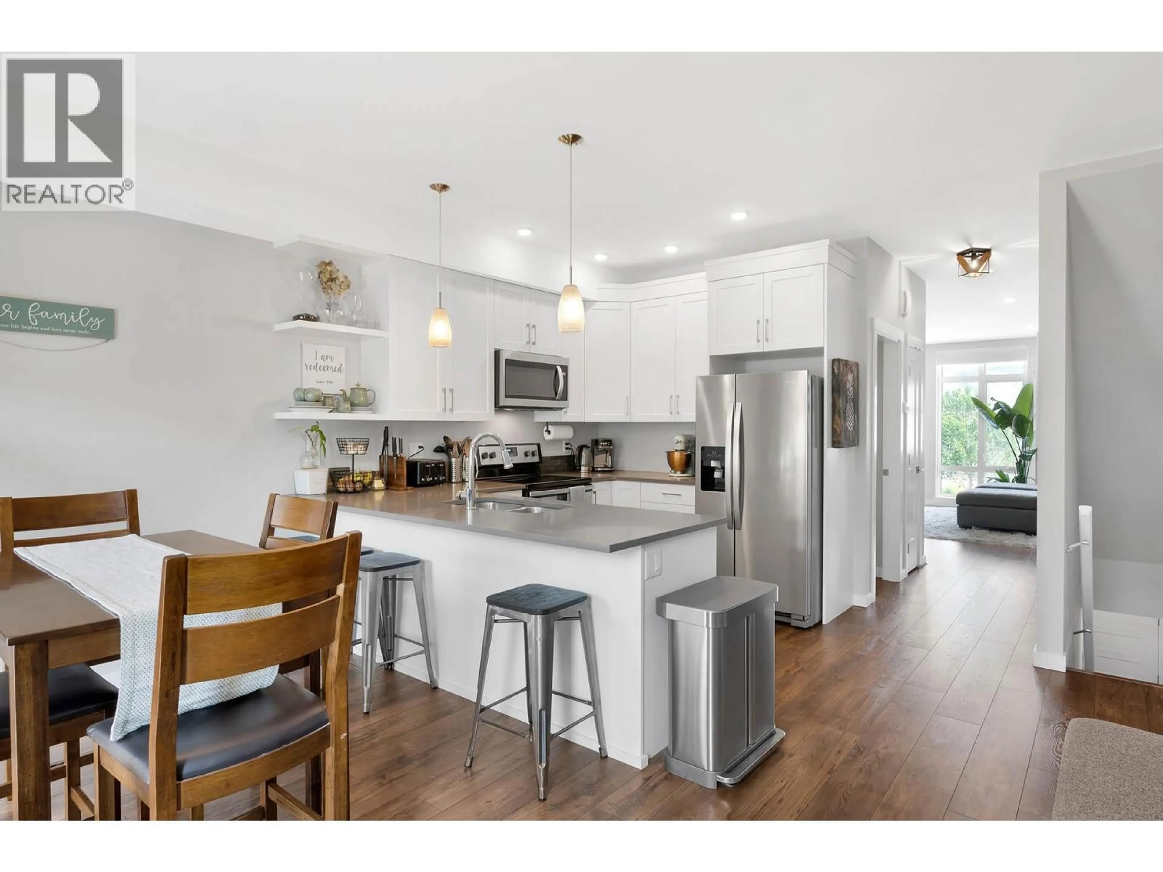 Open concept kitchen, wood/laminate floor for 124 - 1951 QU'APPELLE BOULEVARD, Kamloops British Columbia V2E0C8