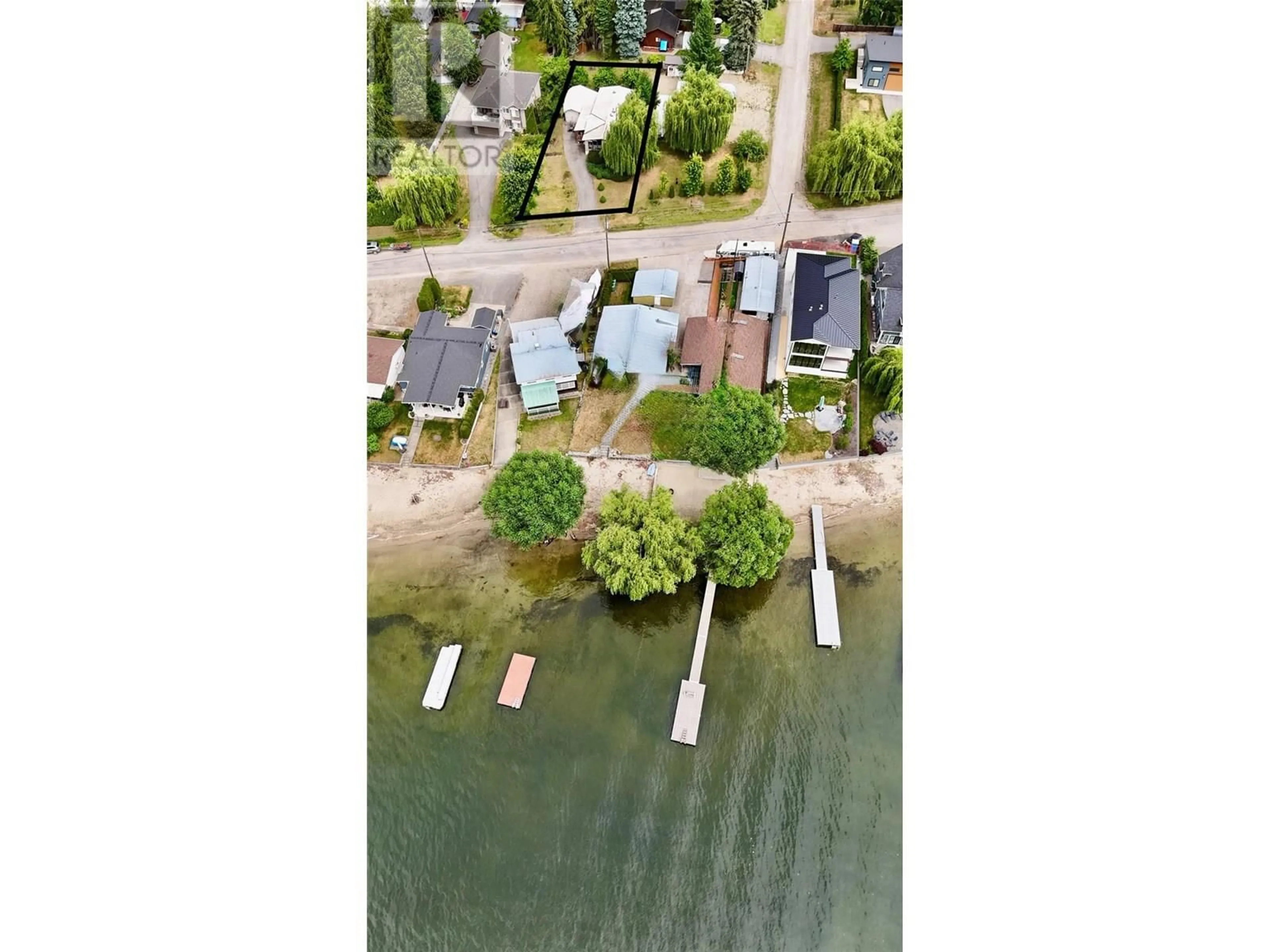 A pic from outside/outdoor area/front of a property/back of a property/a pic from drone, water/lake/river/ocean view for 8936 SWANSHORE ROAD, Swansea Point British Columbia V0E2K2