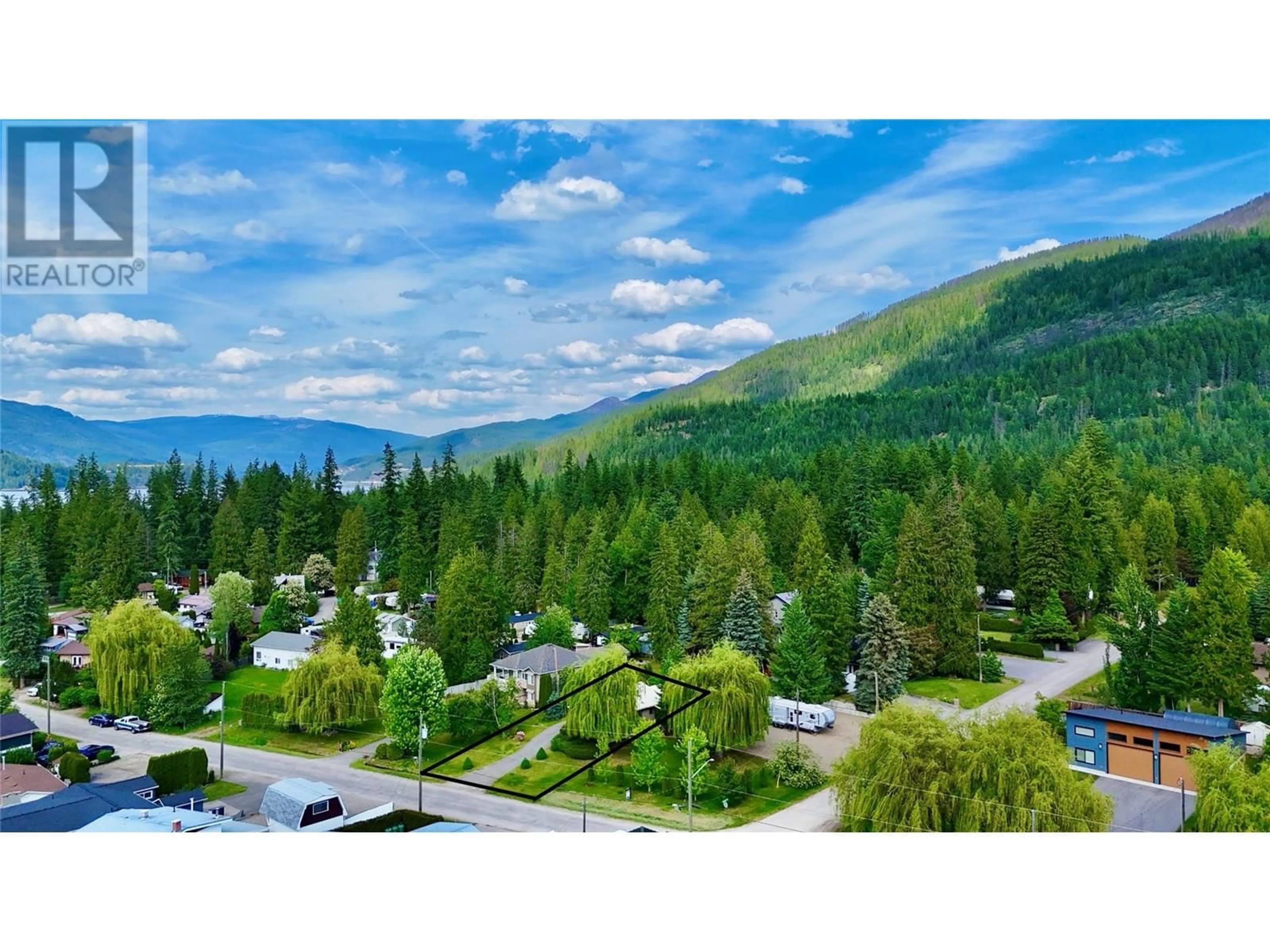 A pic from outside/outdoor area/front of a property/back of a property/a pic from drone, mountain view for 8936 SWANSHORE ROAD, Swansea Point British Columbia V0E2K2
